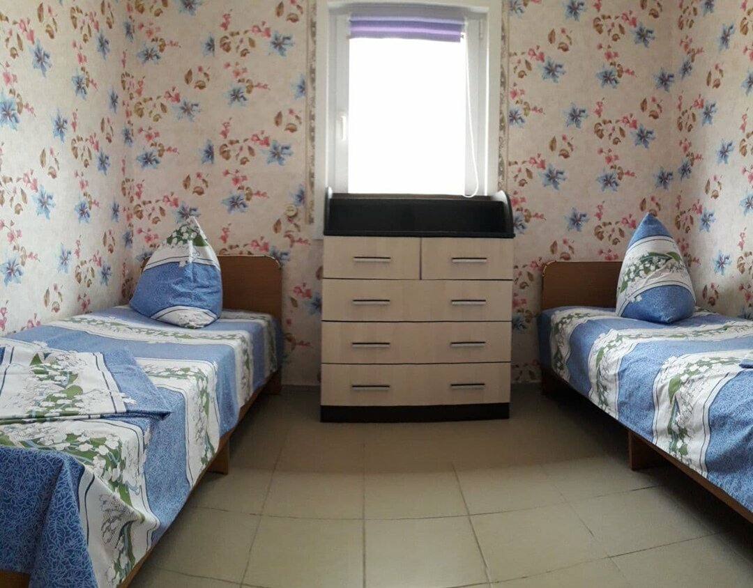 Четырехместный номер с двумя спальнями, кухней и верандой