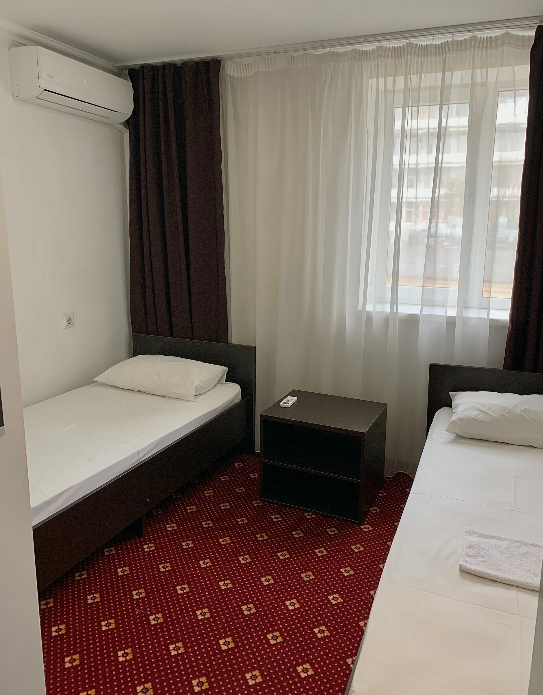 Двухместный номер эконом-класса с 2 отдельными кроватями