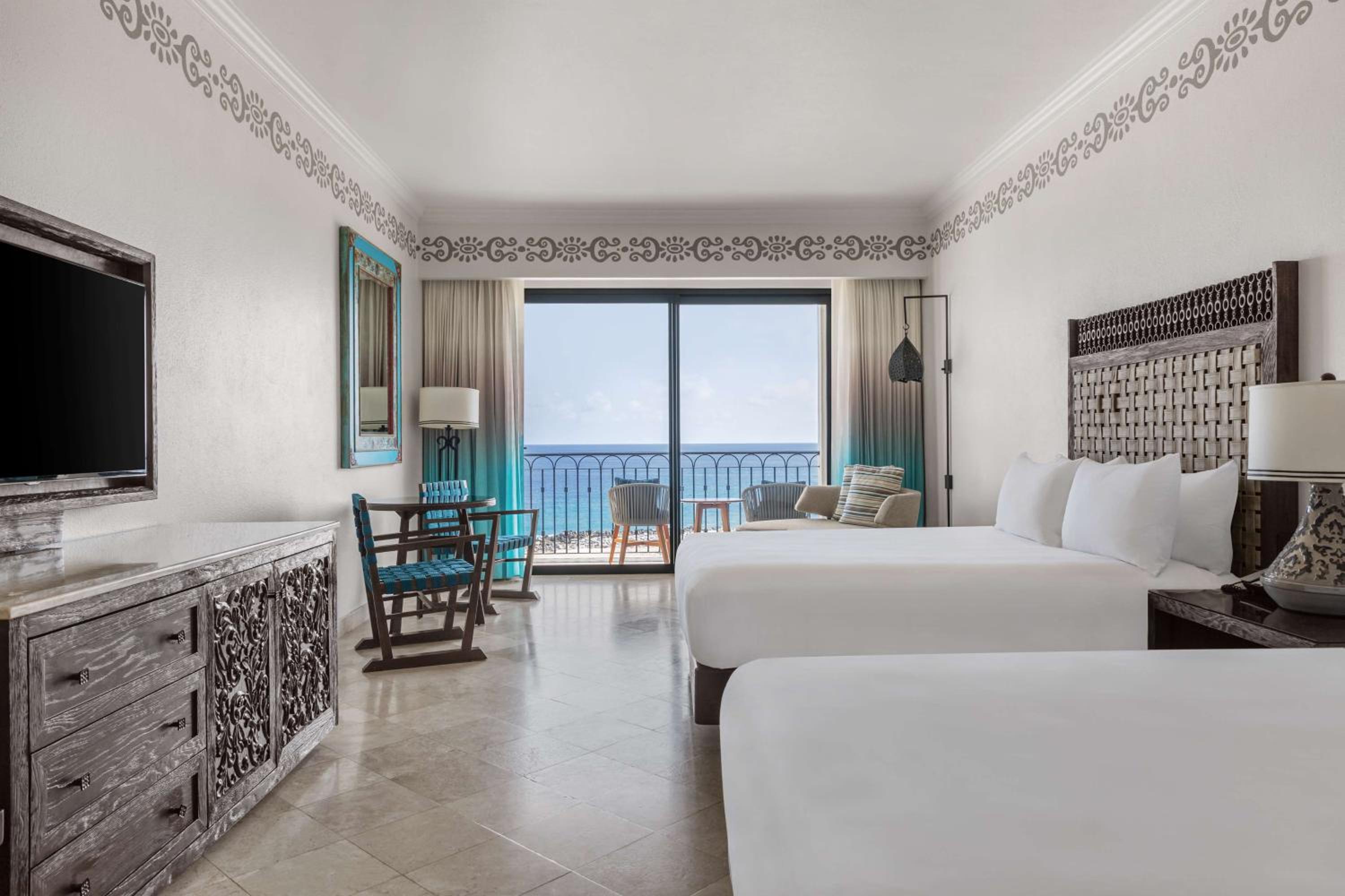 Deluxe Oceanfront Queen Room with Two Queen Beds and Balcony