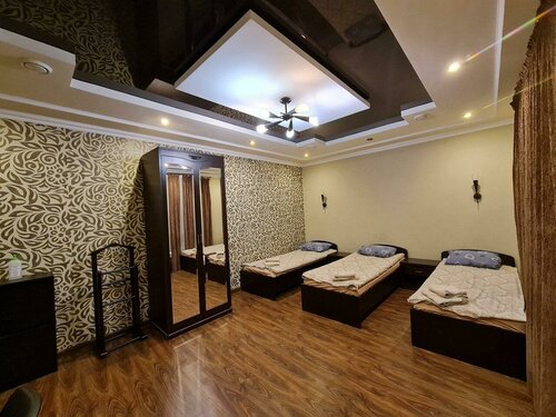 Общий Стандартный 4-х местный номер с 4 кроватями и душем