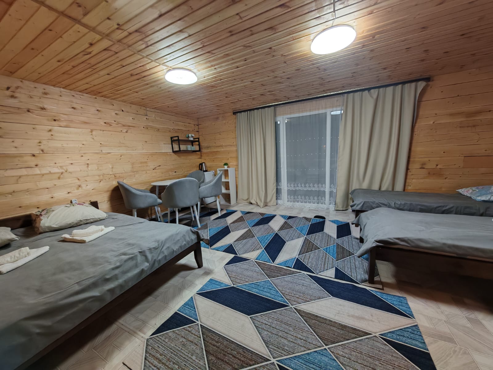 Четырехместный номер с видом на сад