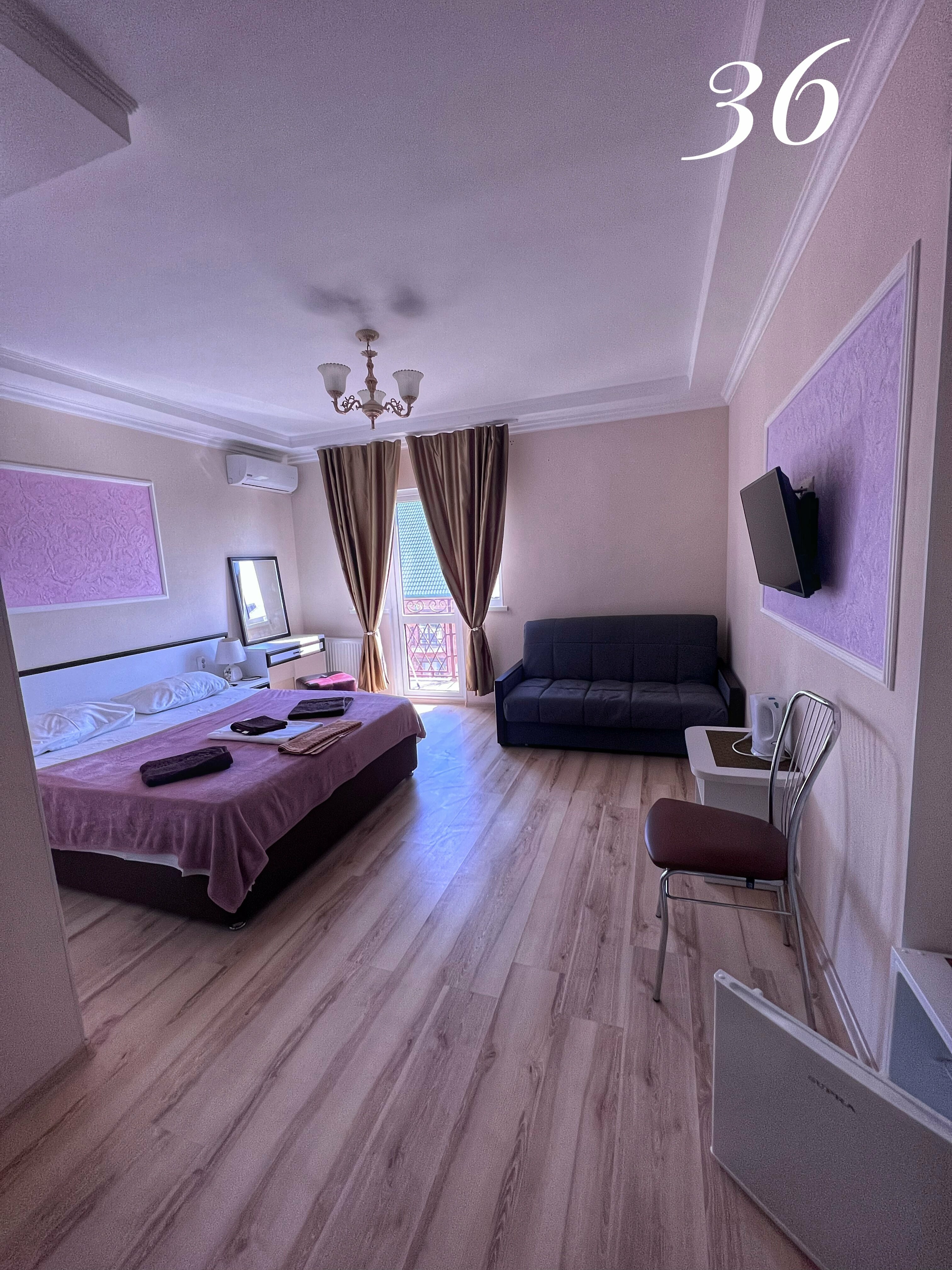 Улучшенный четырехместный номер