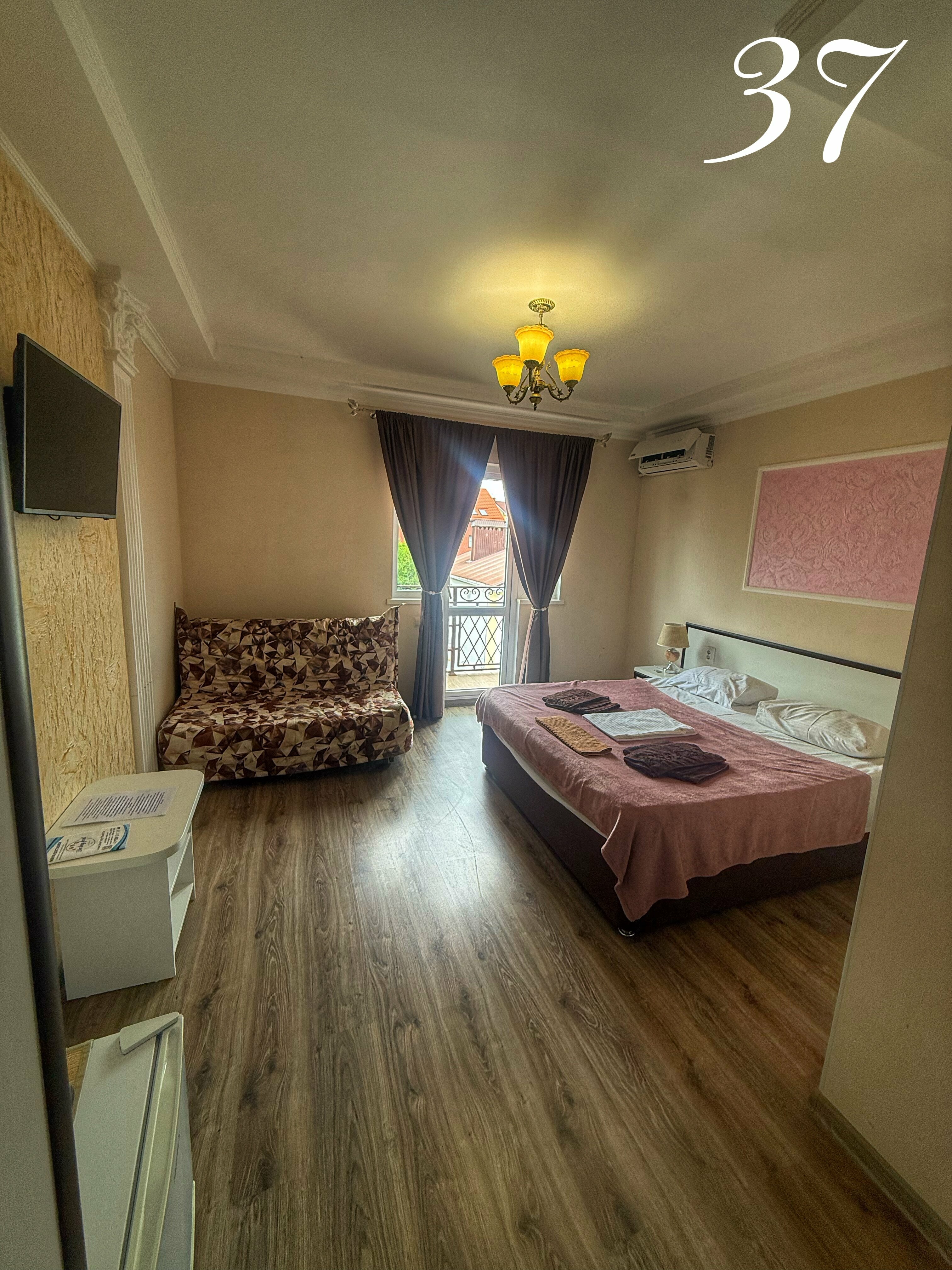 Улучшенный четырехместный номер