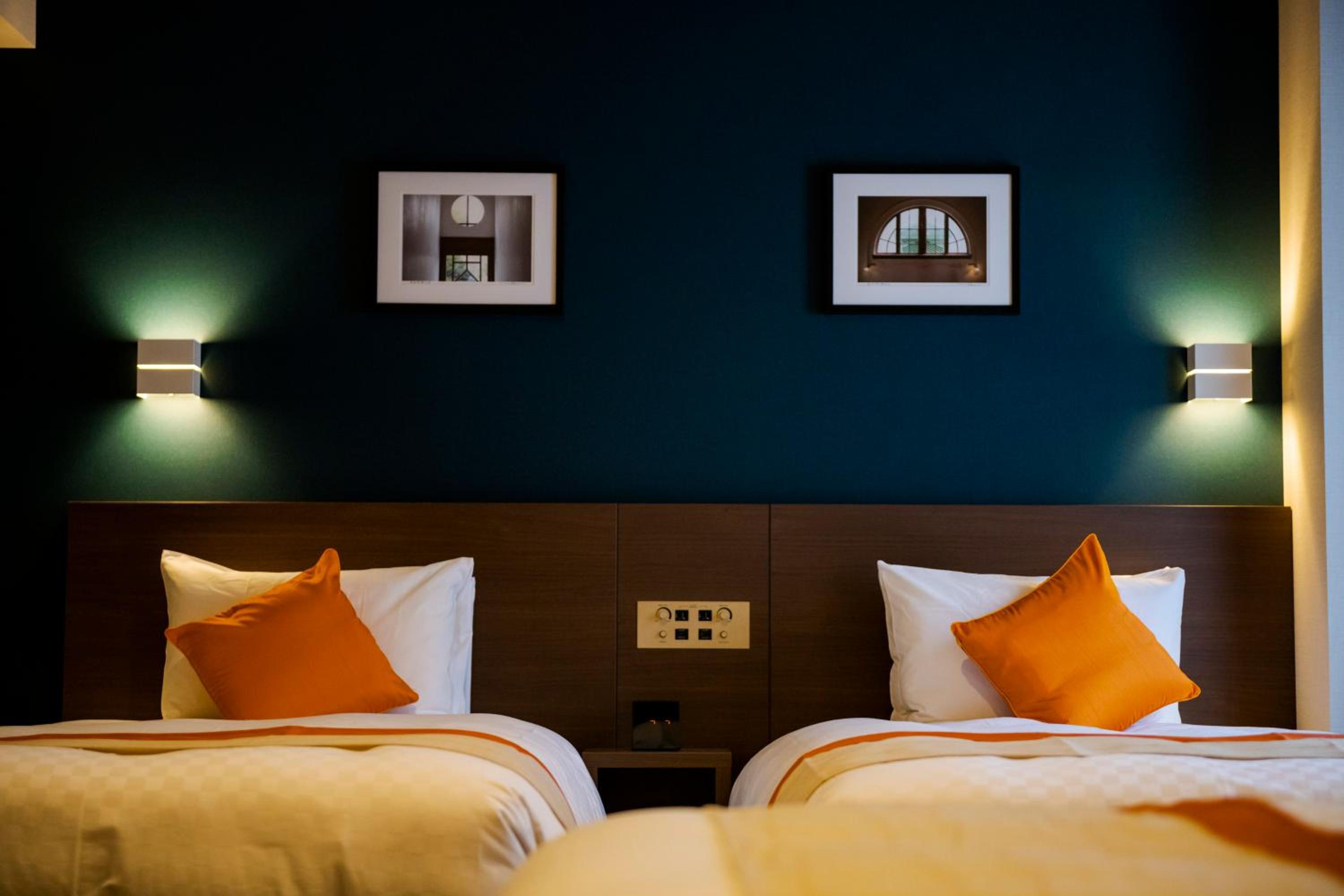 Quadruple Room with four single beds