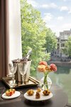 Canal View Suite в Anantara Grand Hotel Krasnapolsky Amsterdam