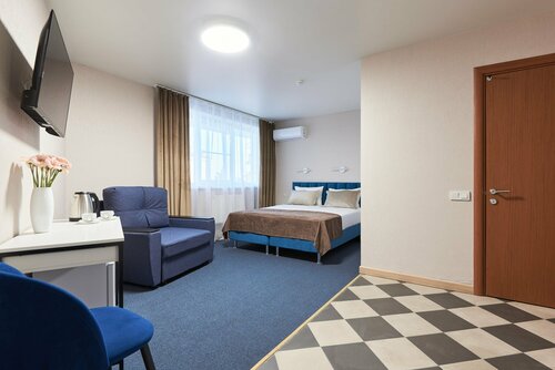 Трехместный номер Делюкс