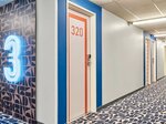 2 single beds and 1 bunk bed Room в ibis budget Paris Aubervilliers