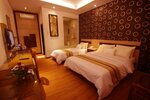 Улучшенный трехместный номер (with twin bed) в Kusuma Agrowisata Resort & Convention Hotel