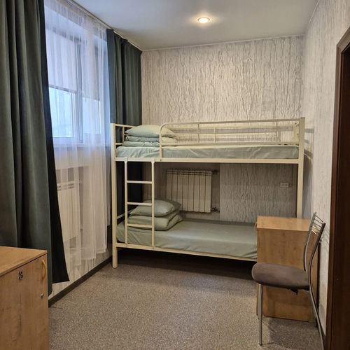 Кровать в общем номере для женщин с 4 кроватями