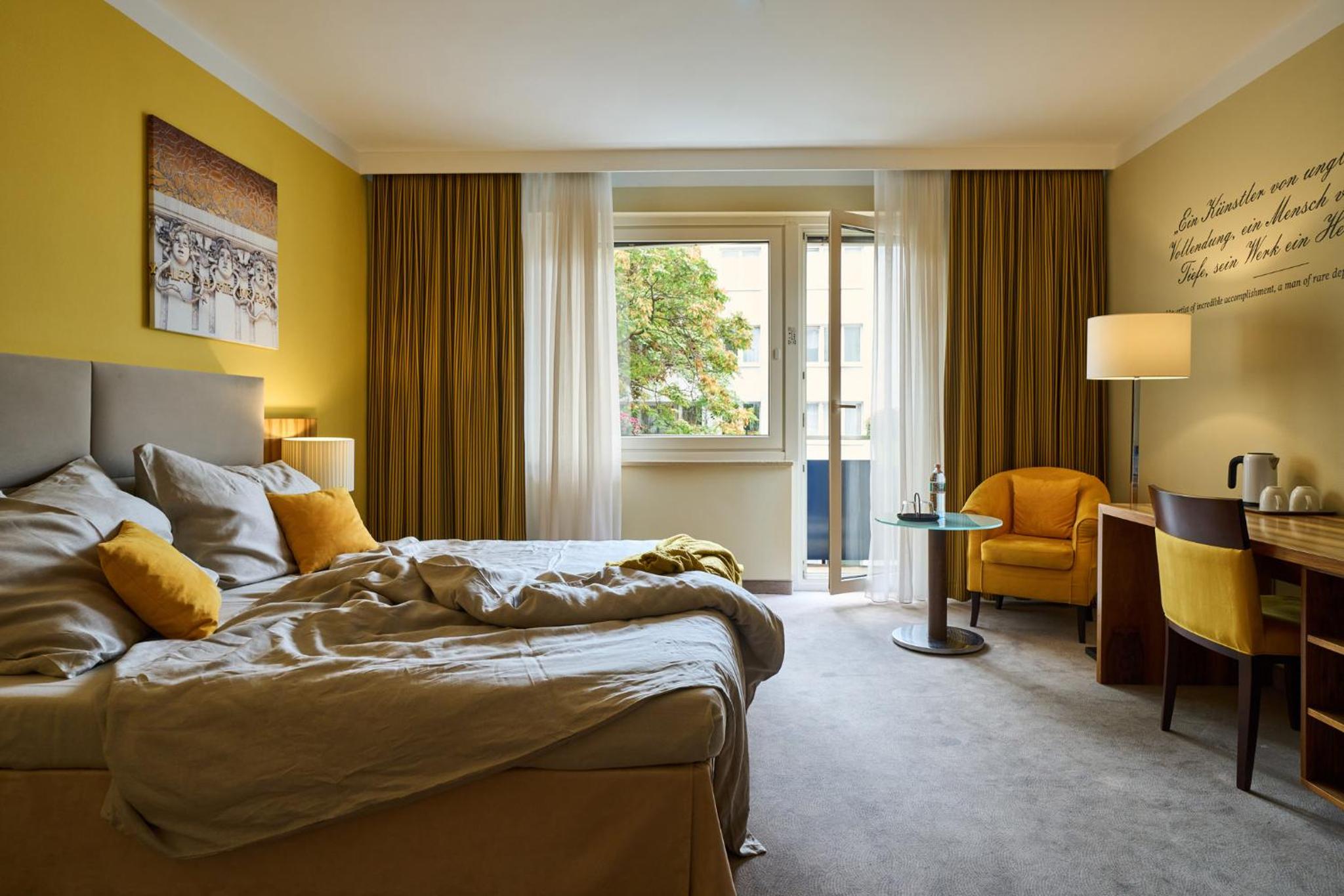 Deluxe Double Room with Balcony and Courtyard View