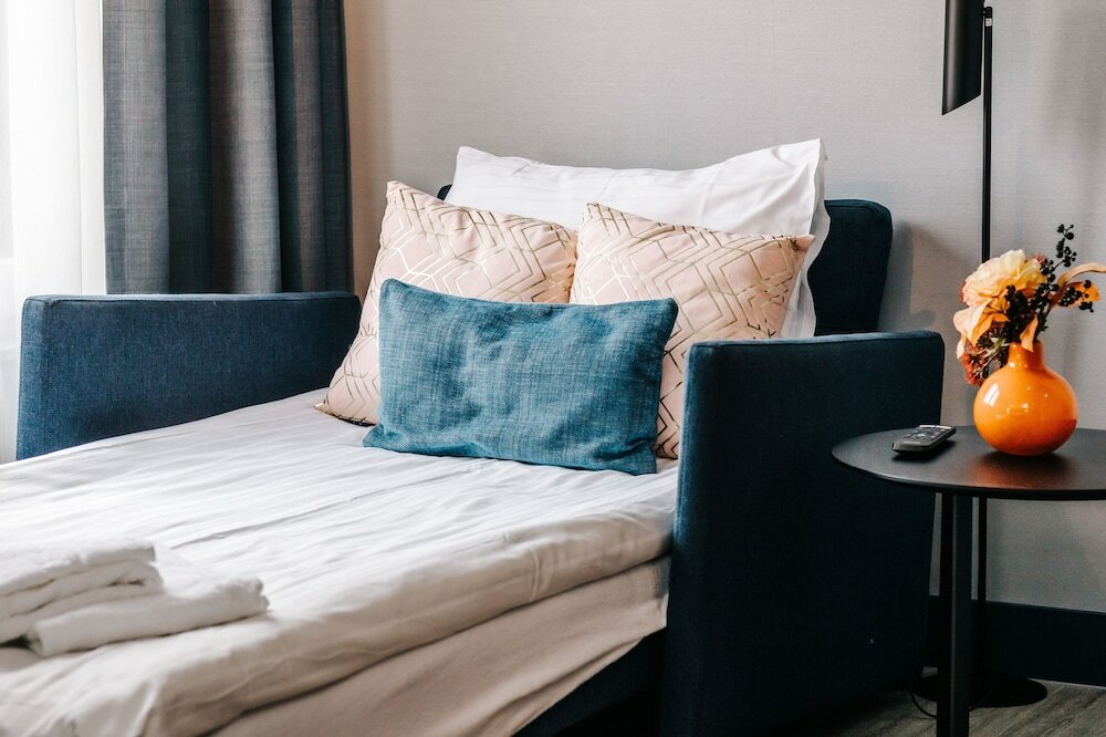 Triple Room, 1 Queen Bed with Sofa bed