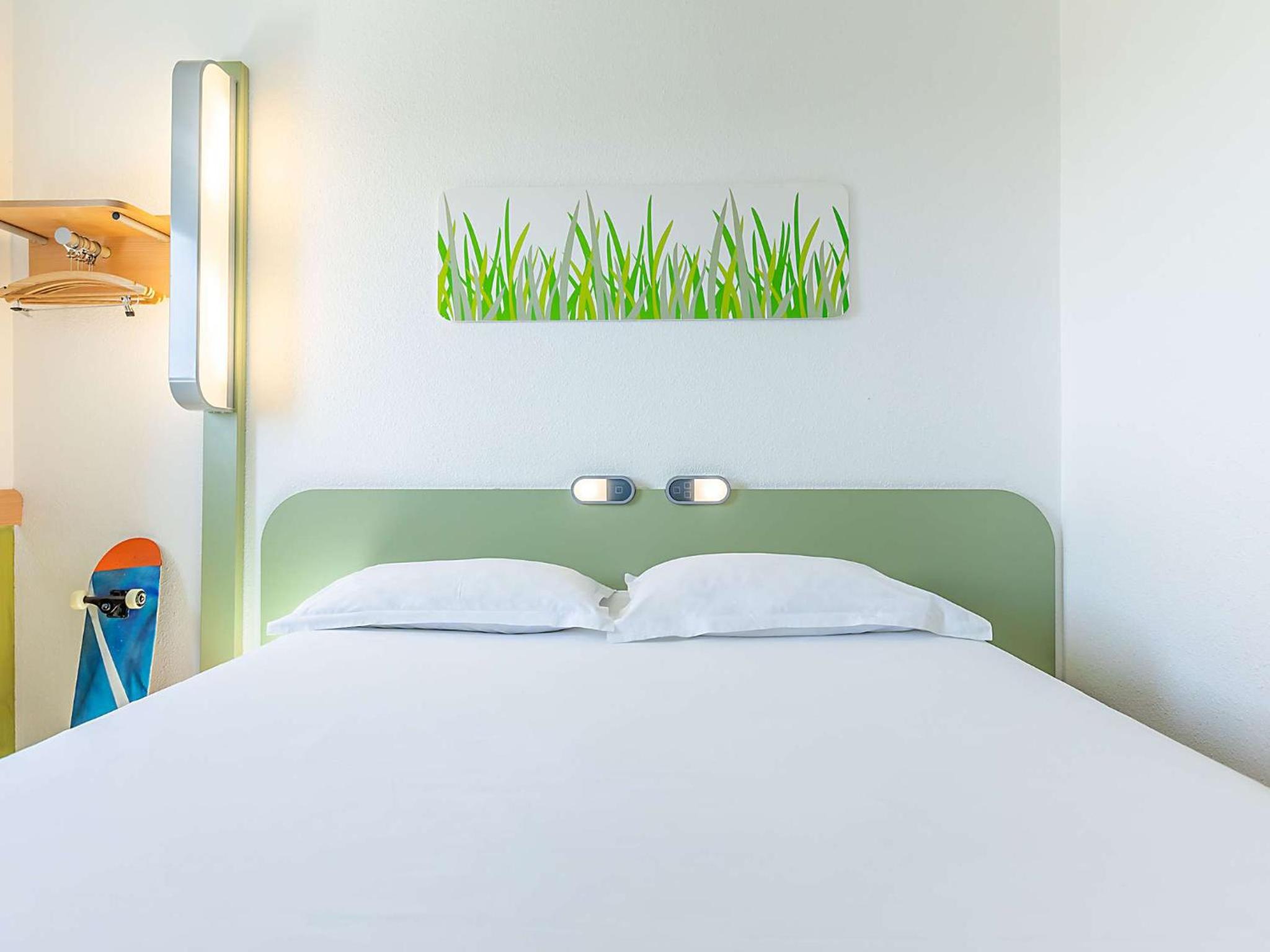 Small double room with private bathroom and toilet