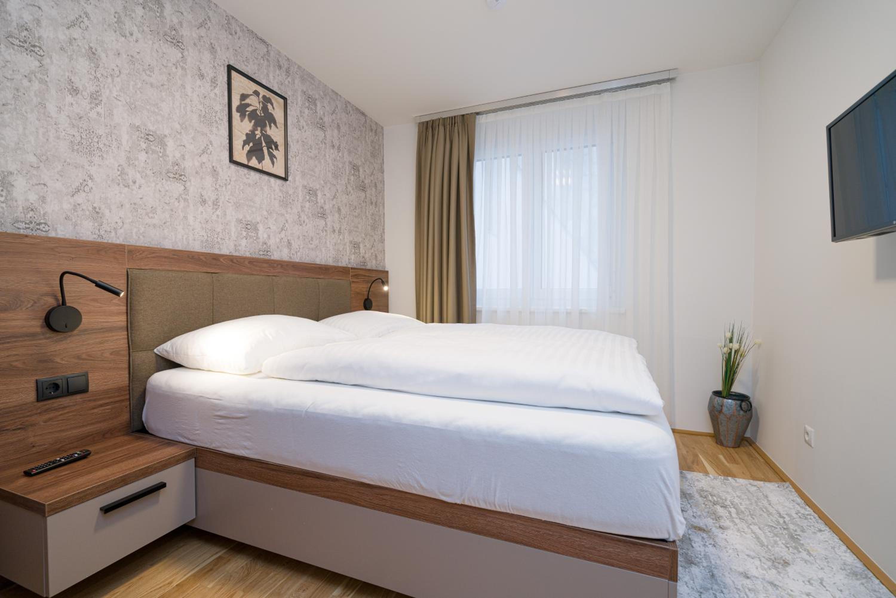 Four-Bedroom Apartment with Balcony 