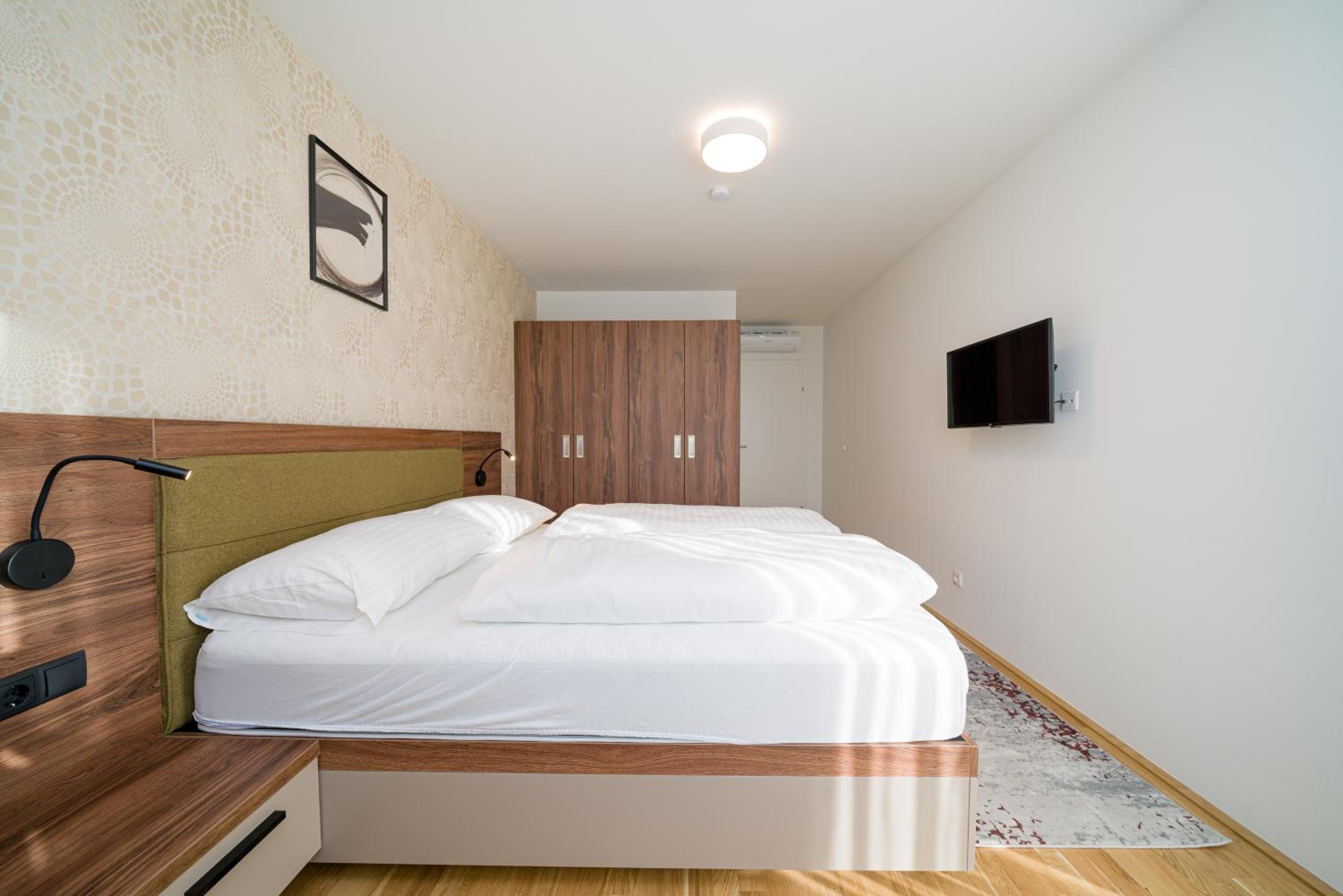 Four-Bedroom Apartment with Balcony 