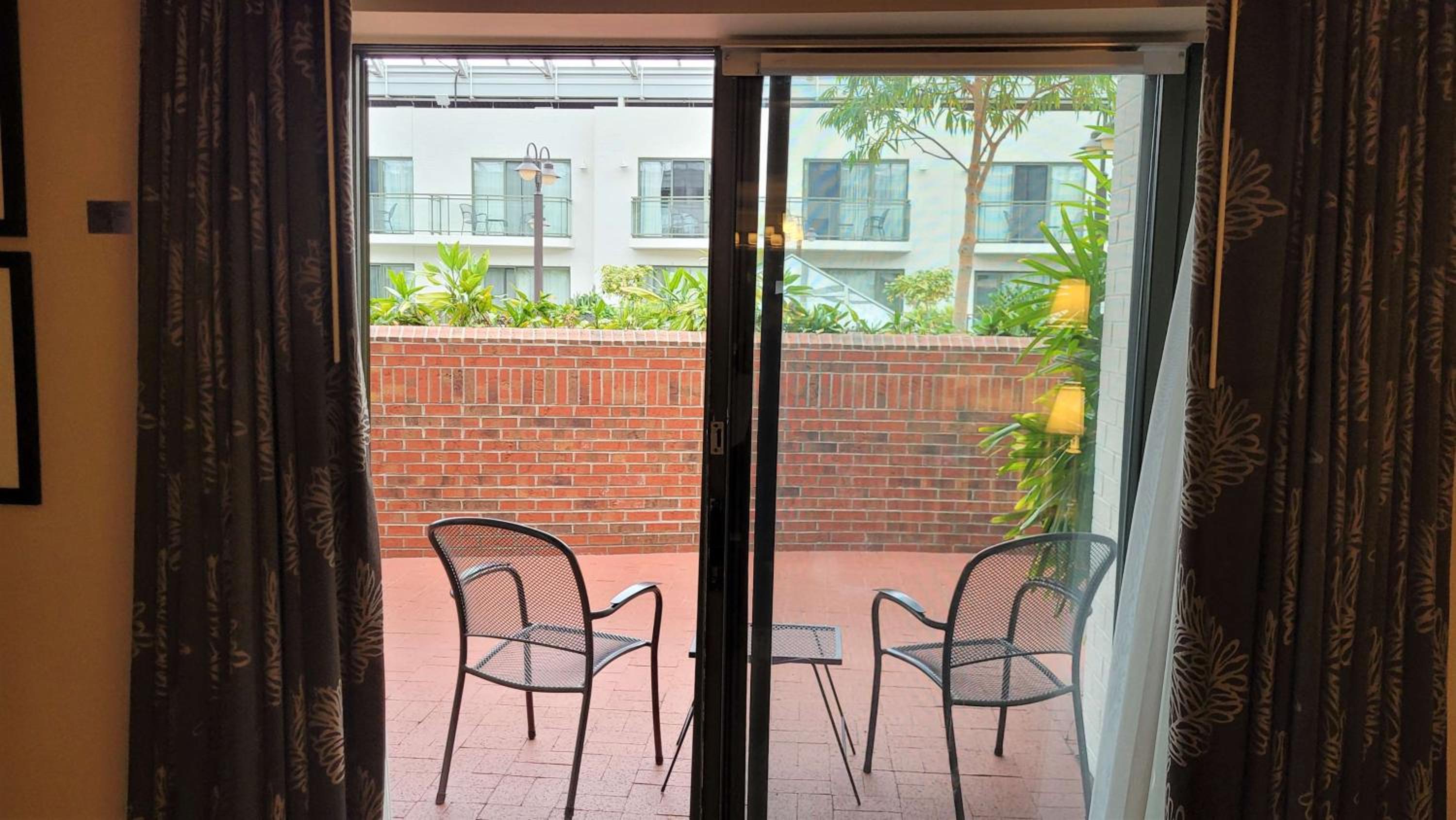 Queen Suite with Sofa Bed and Patio - Atrium View