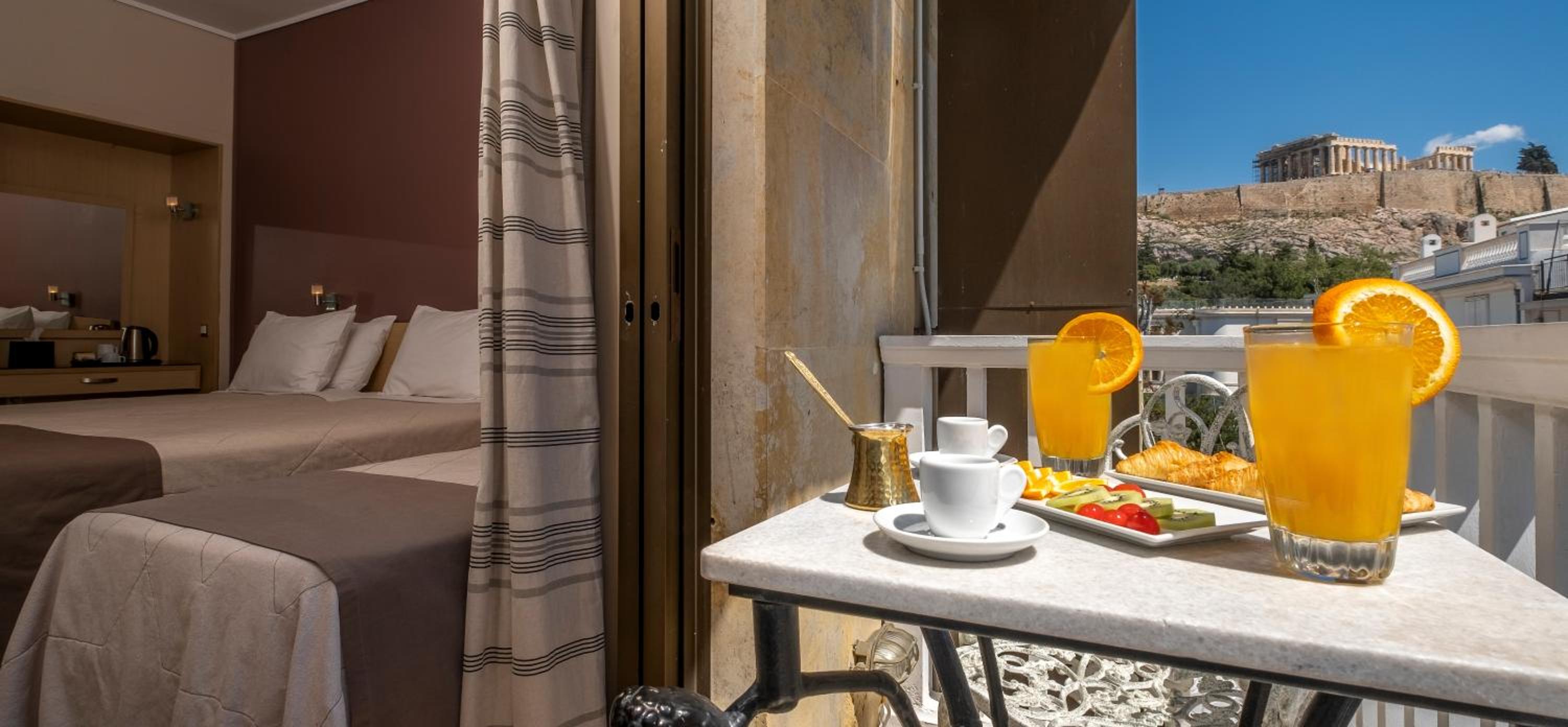 Twin room with extra bed and view to the Acropolis