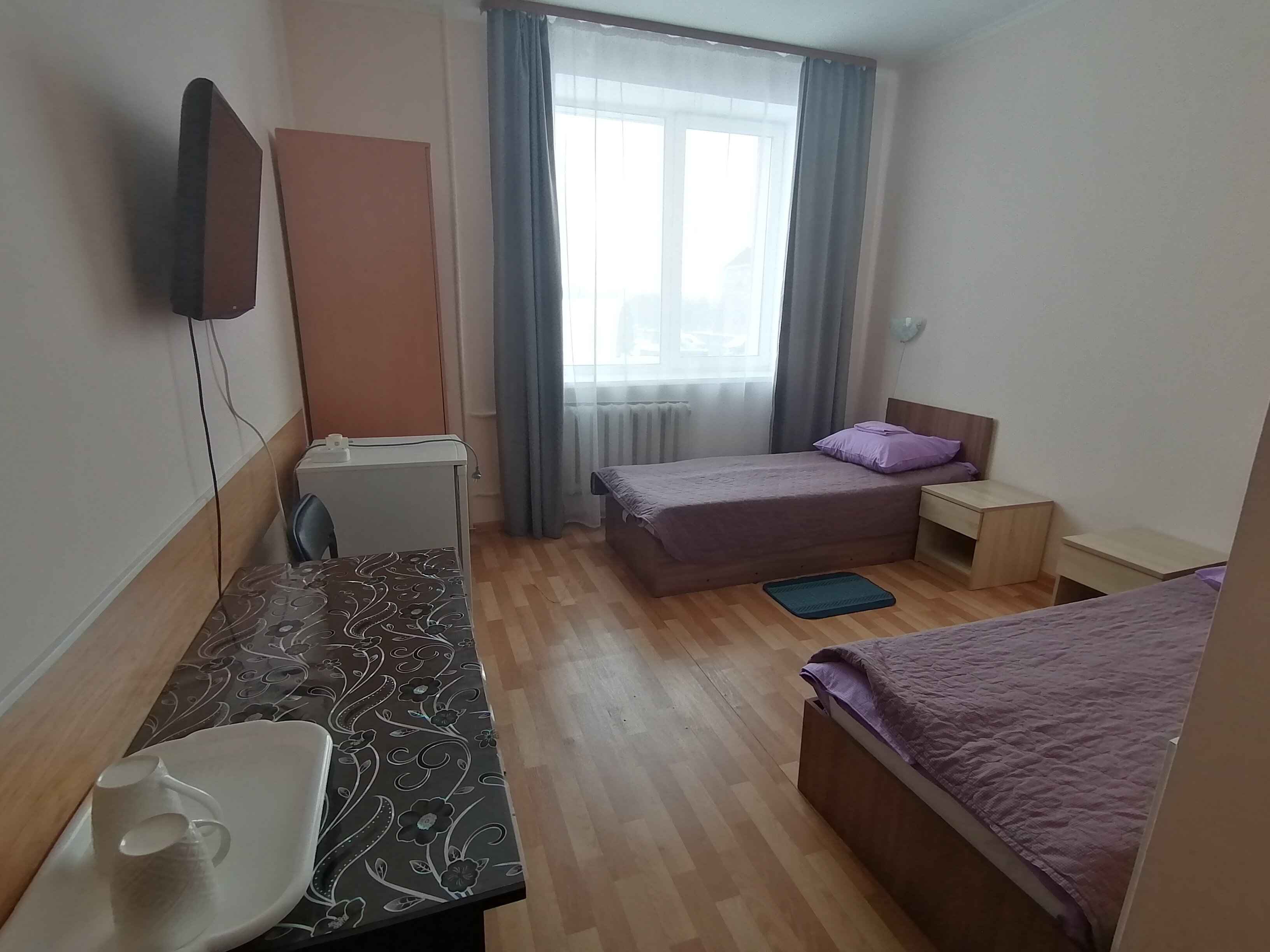 Двухместный номер с 2 отдельными кроватями и окном