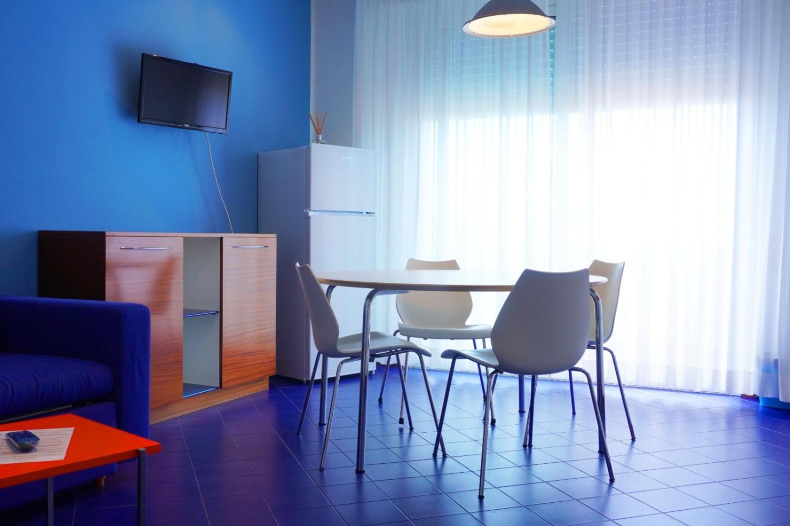 One-Bedroom Apartment with Balcony and Lateral Sea View