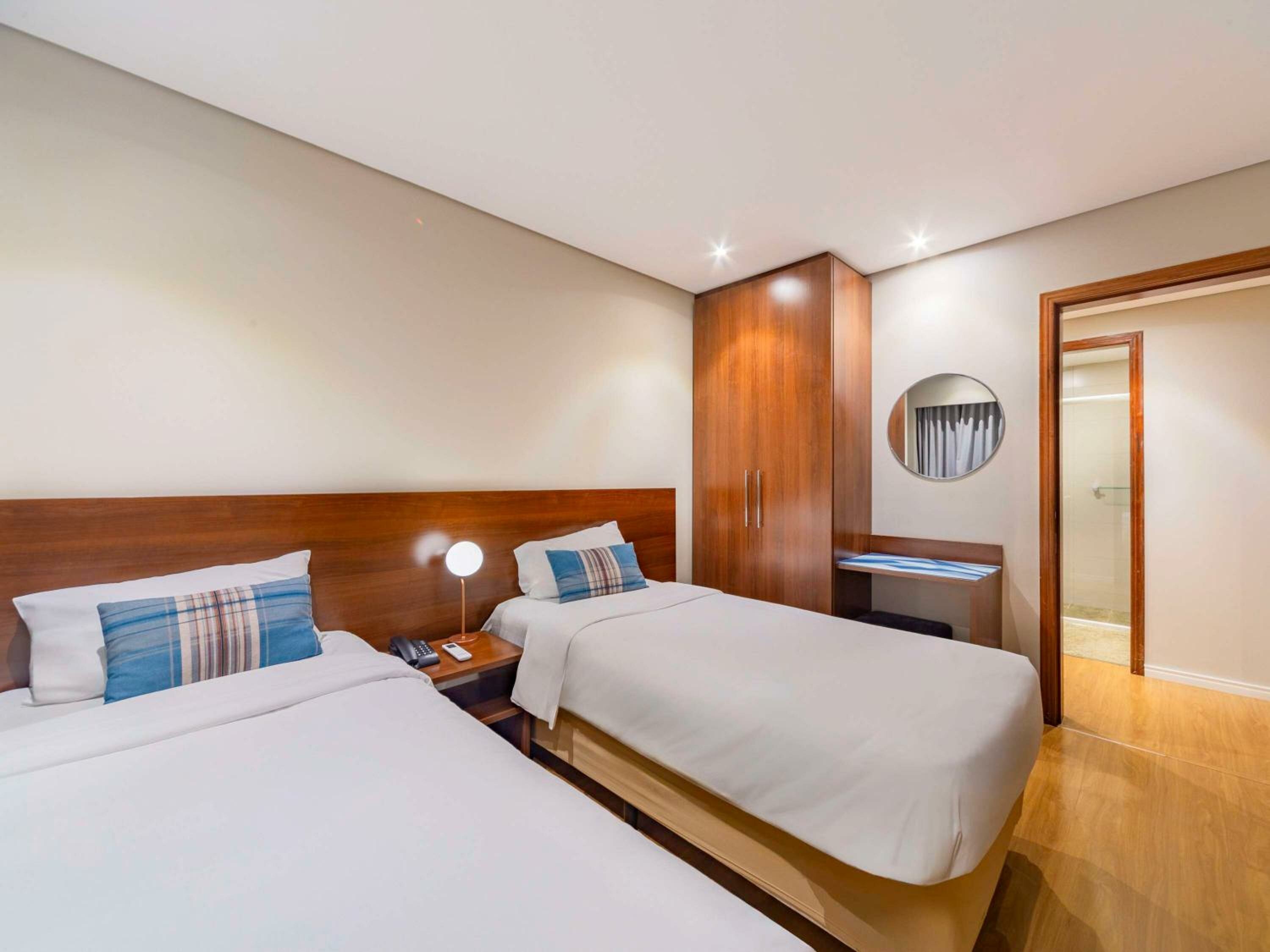 Family Room with One Double Bed, Two Single Beds and One Sofa Bed