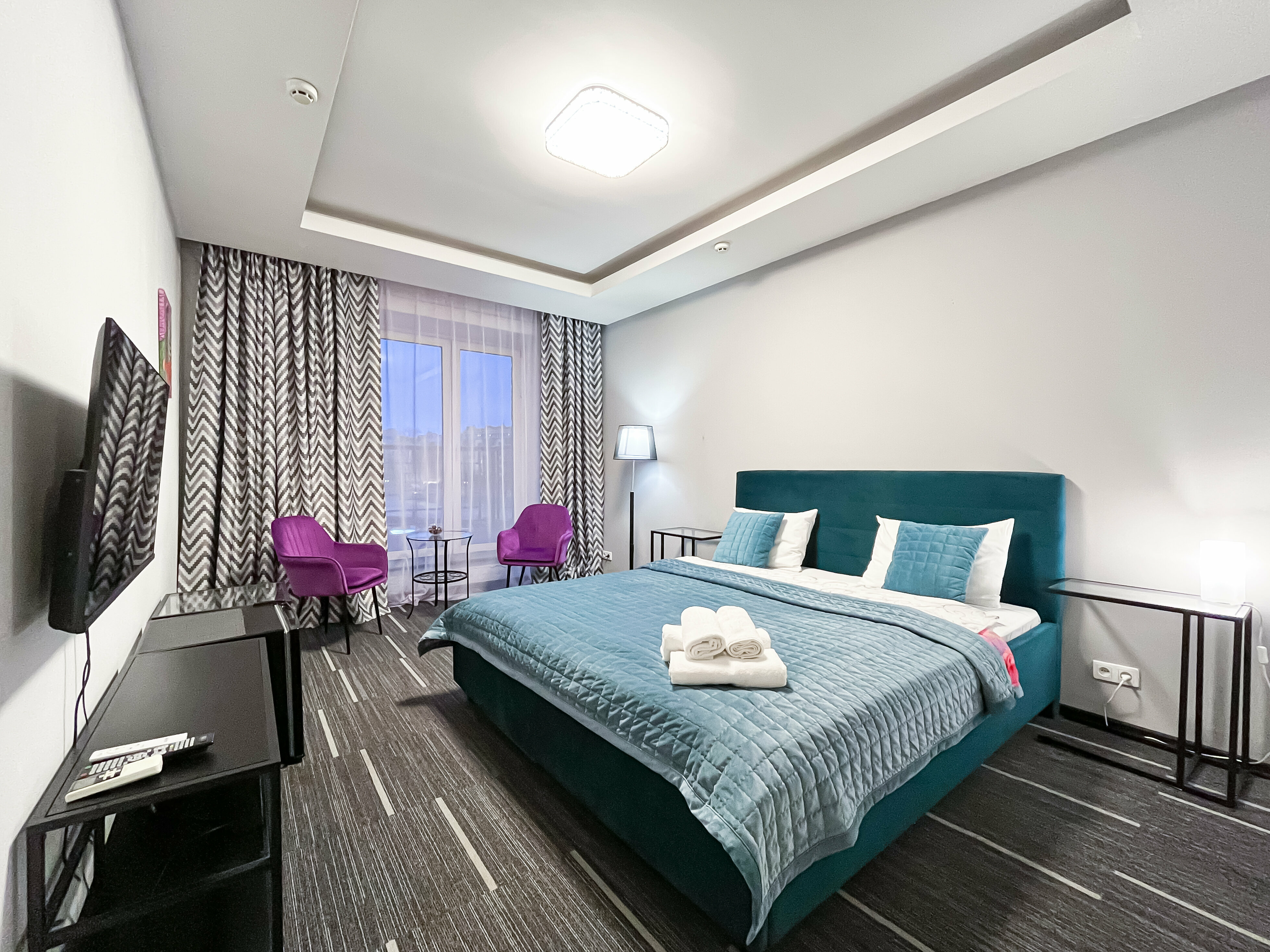 Делюкс с балконом и двуспальной кроватью