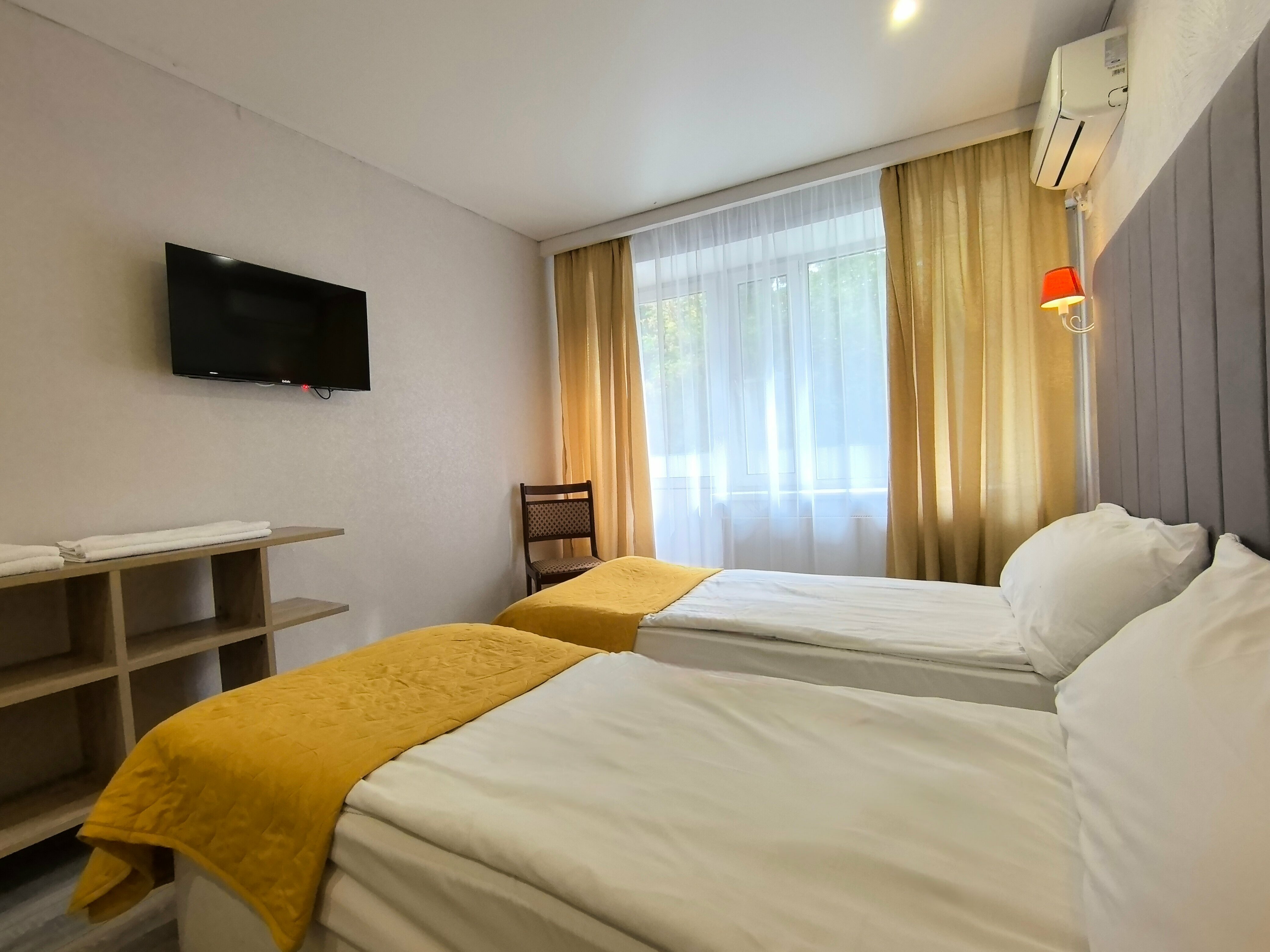 Двухместный номер с 2 отдельными кроватями и балконом