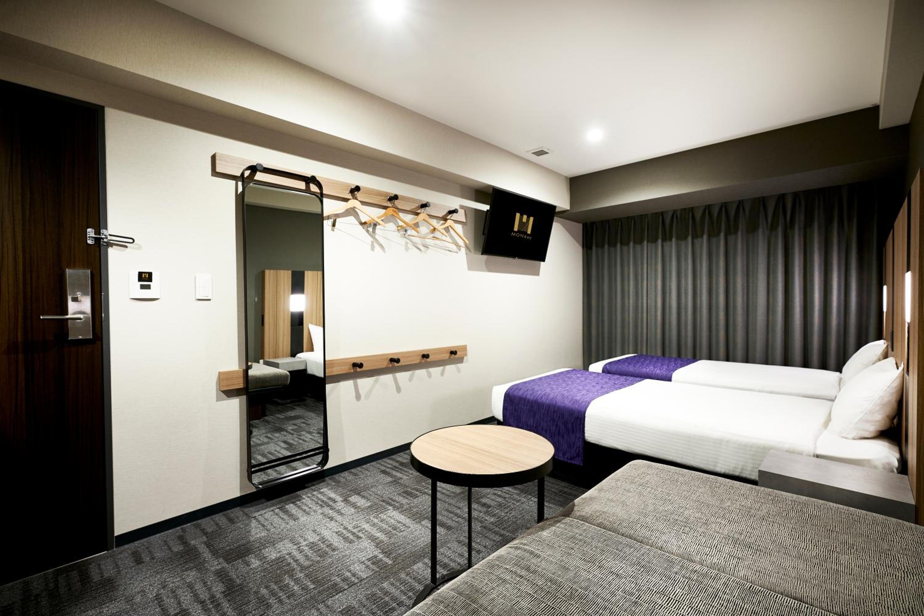 Deluxe Twin Room with Sofa Bed and Bath Tub