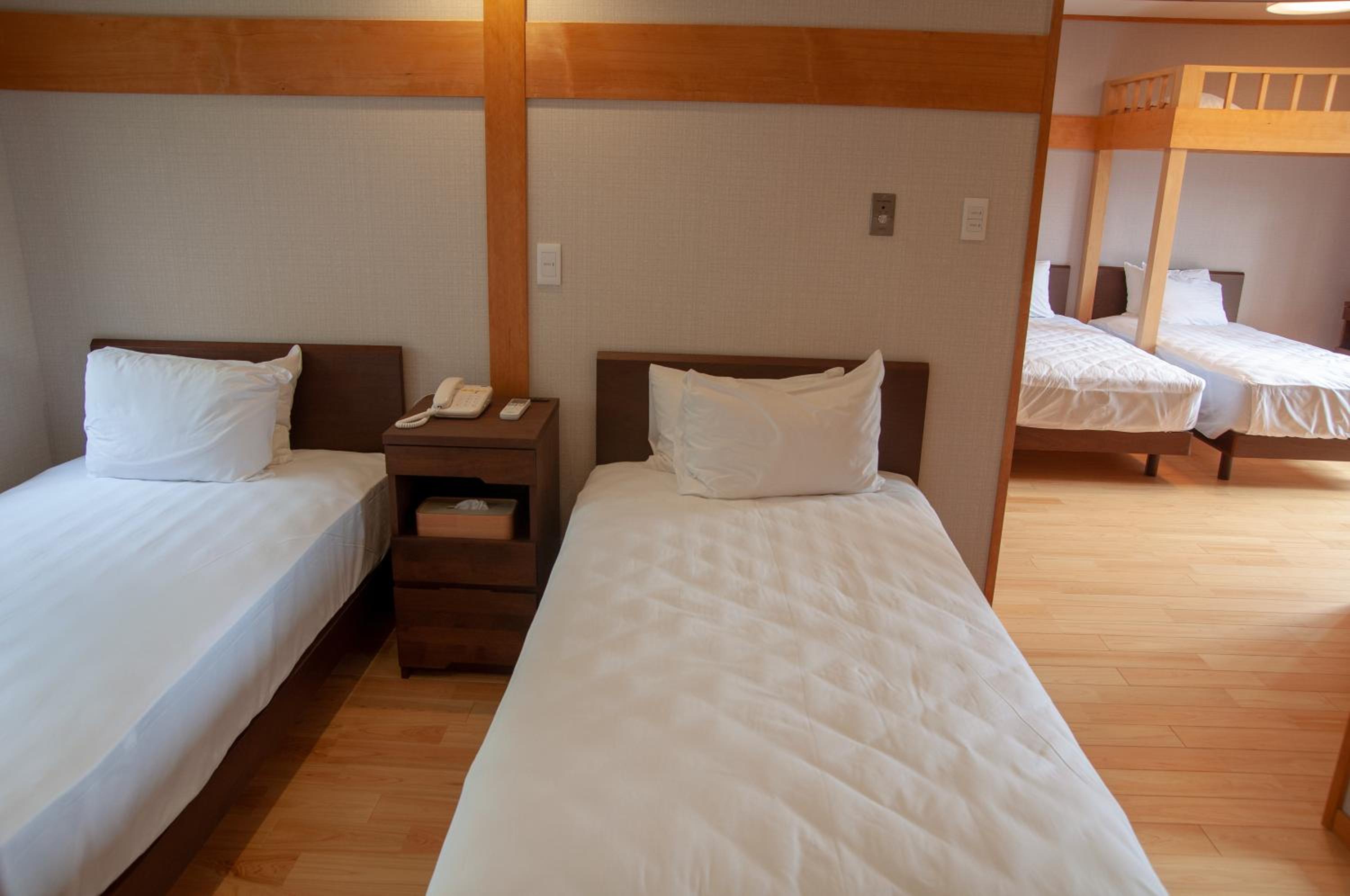 Quadruple Room with Private Bathroom