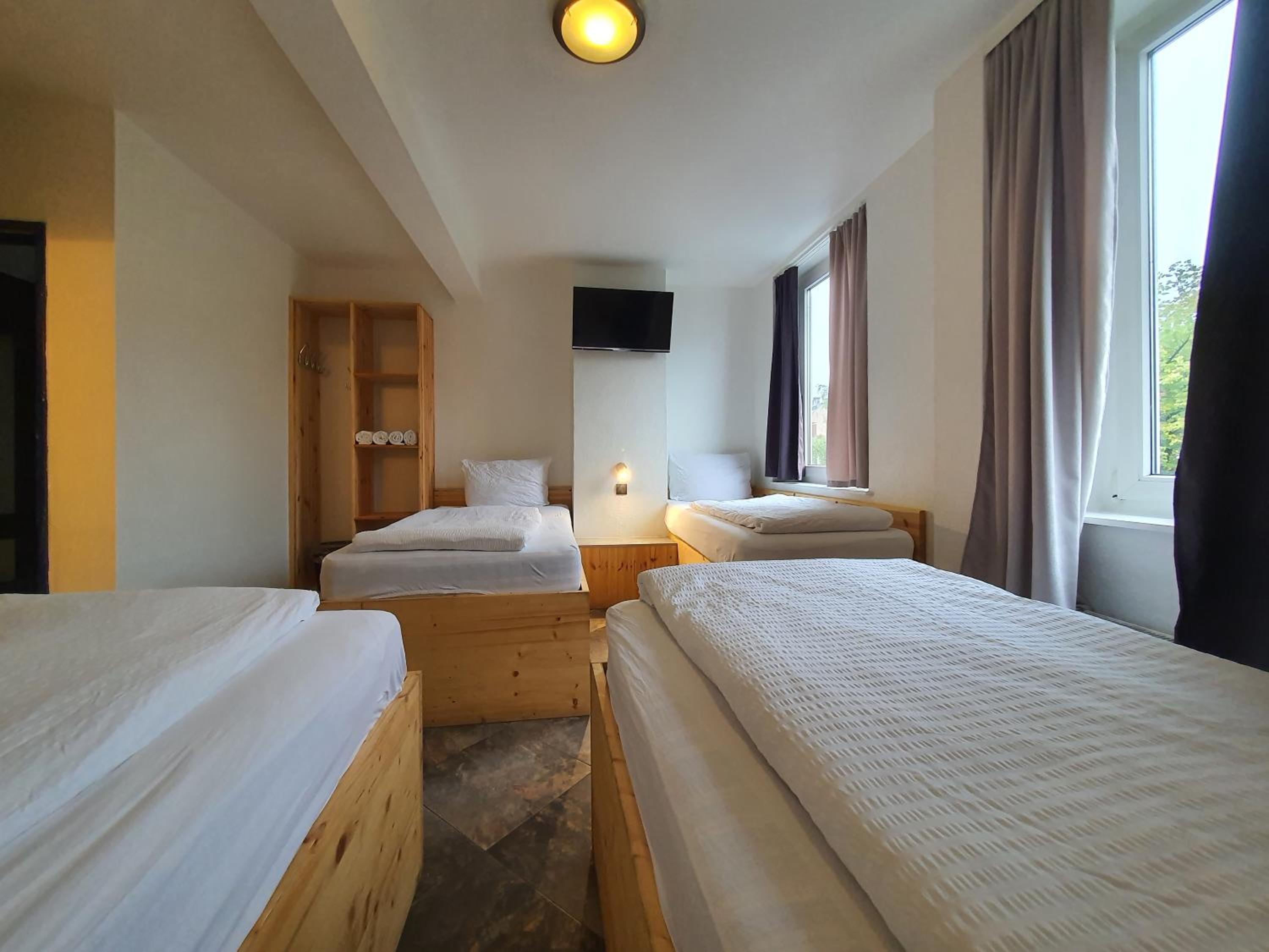 Quadruple Room with Private Bathroom