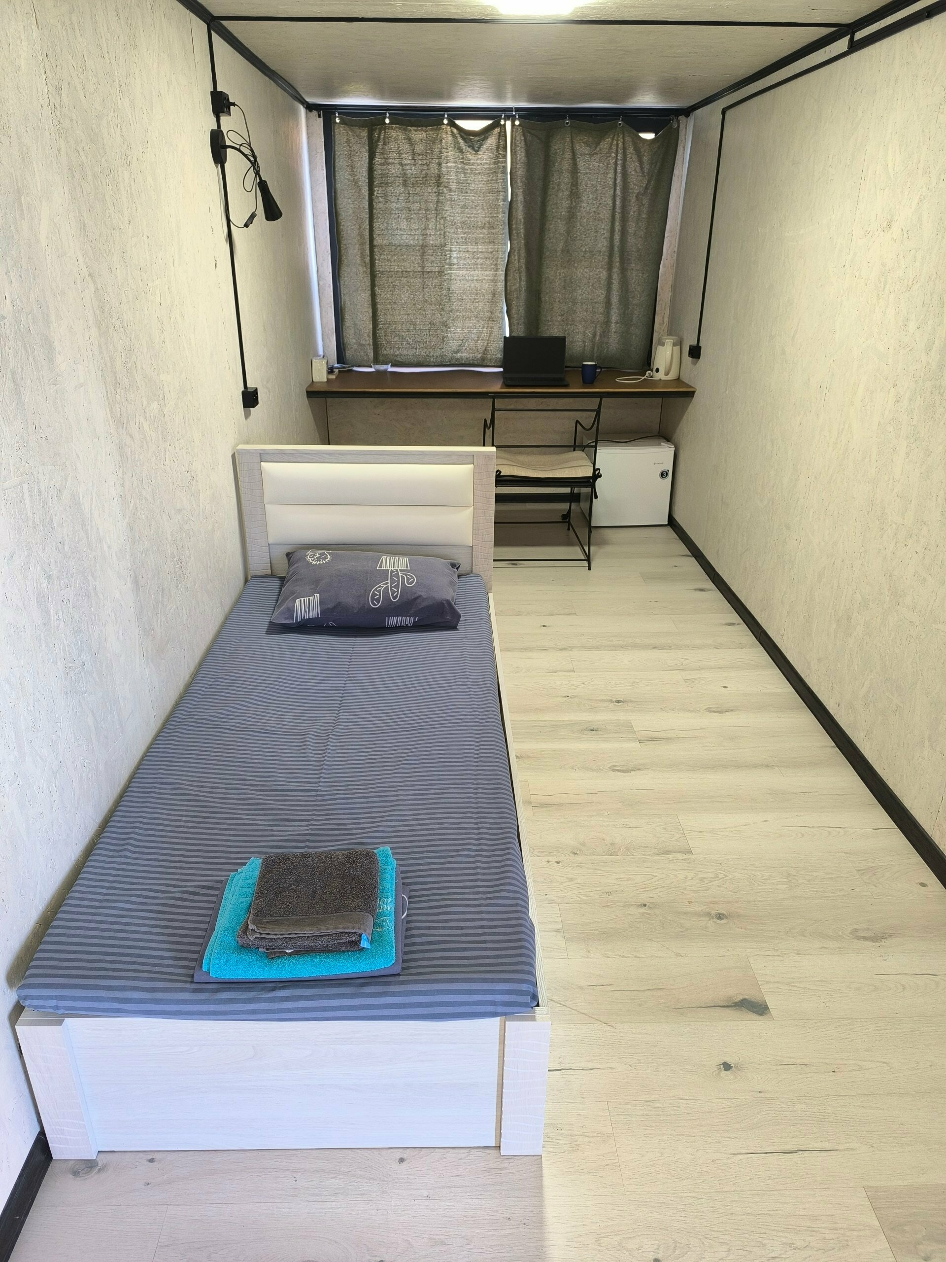 Одноместный номер с общим душем и туалетом