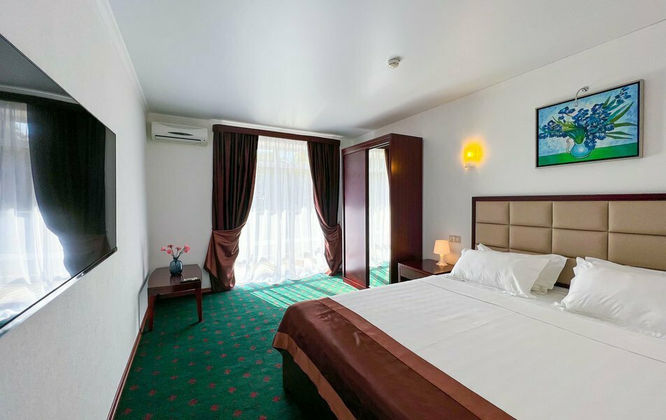 Сюит 2-местный 2-комнатный (1-2 этаж)