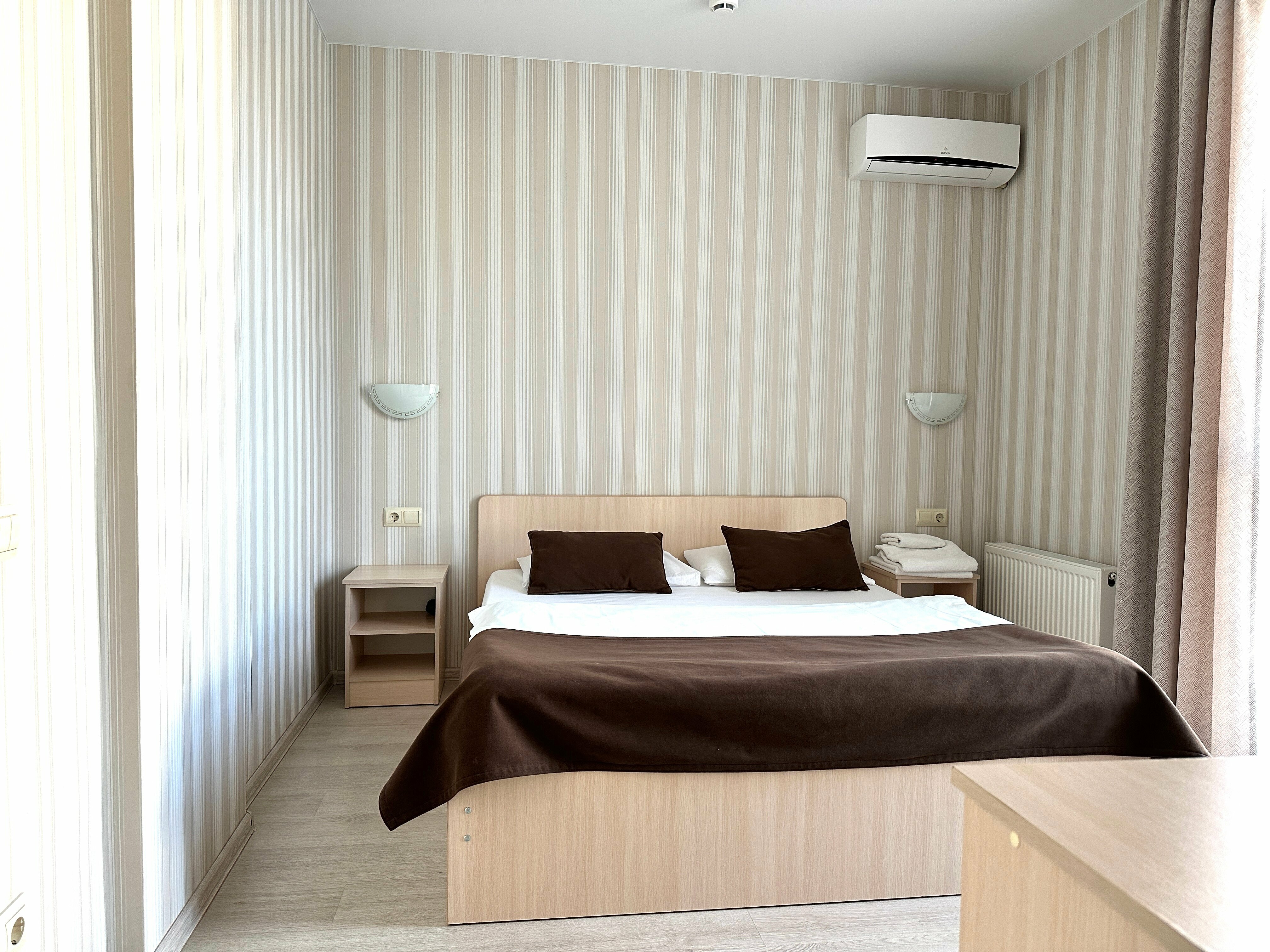 Стандартный двухместный номер с 1 кроватью или 2 отдельными кроватями, вид на сад