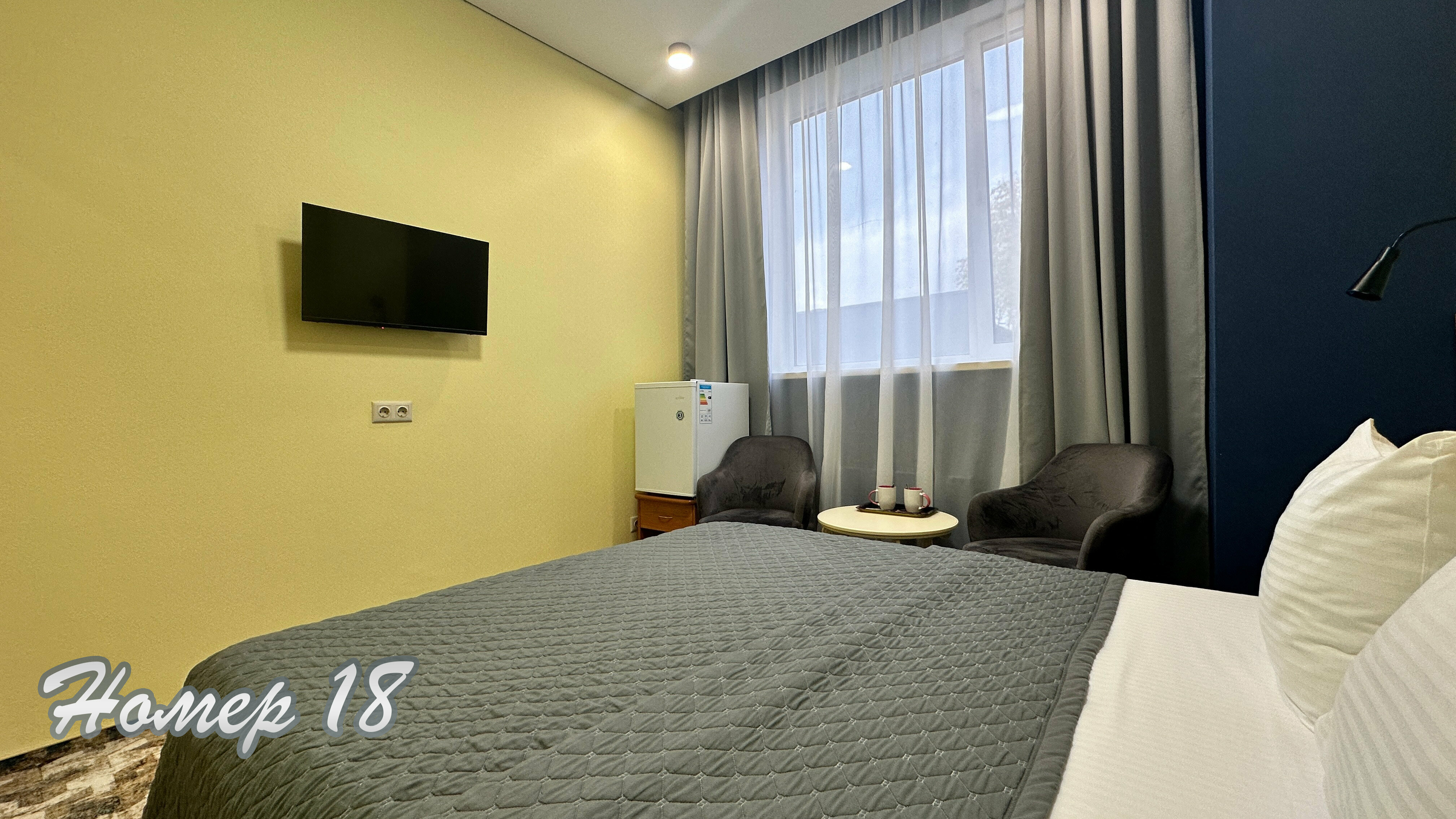 Улучшенный номер с кроватью размера «queen-size»