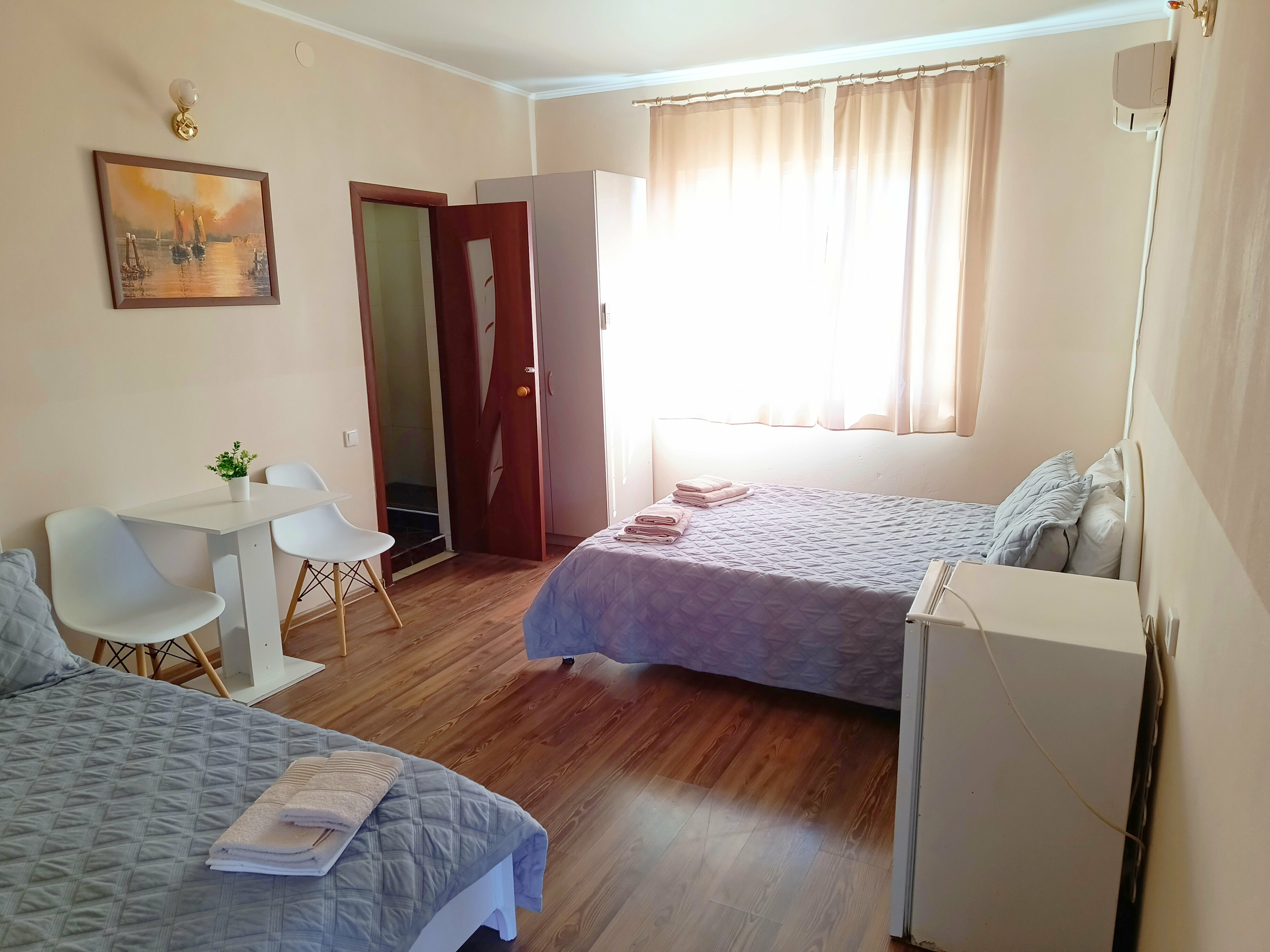 Семейный номер с видом на сад