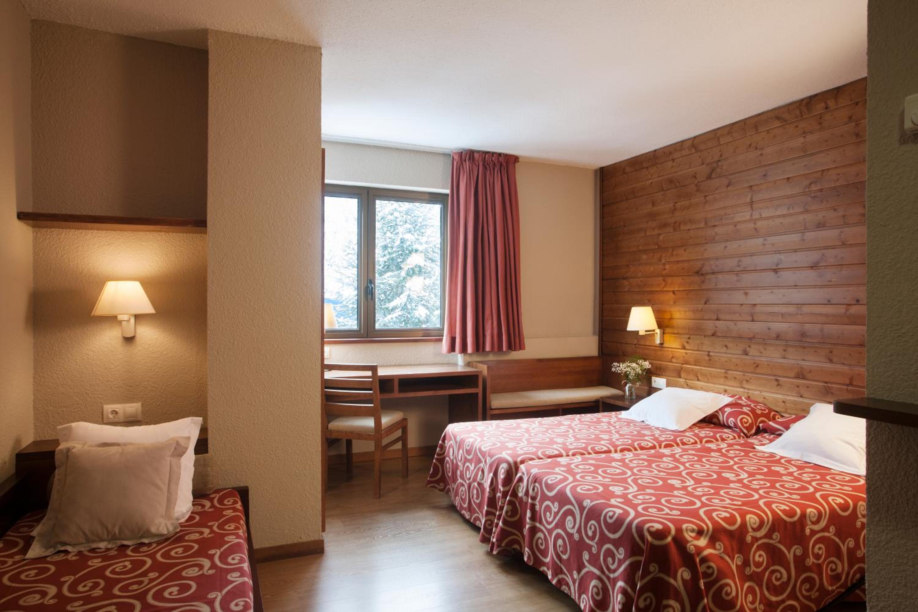 Triple Room (2 Adults + 1 Child)