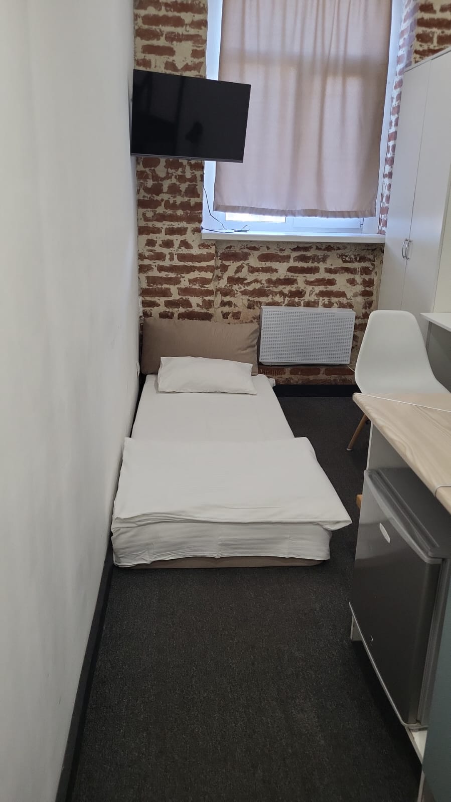 Трехместный номер лофт с двуспальной и раскладным креслом или кроватью