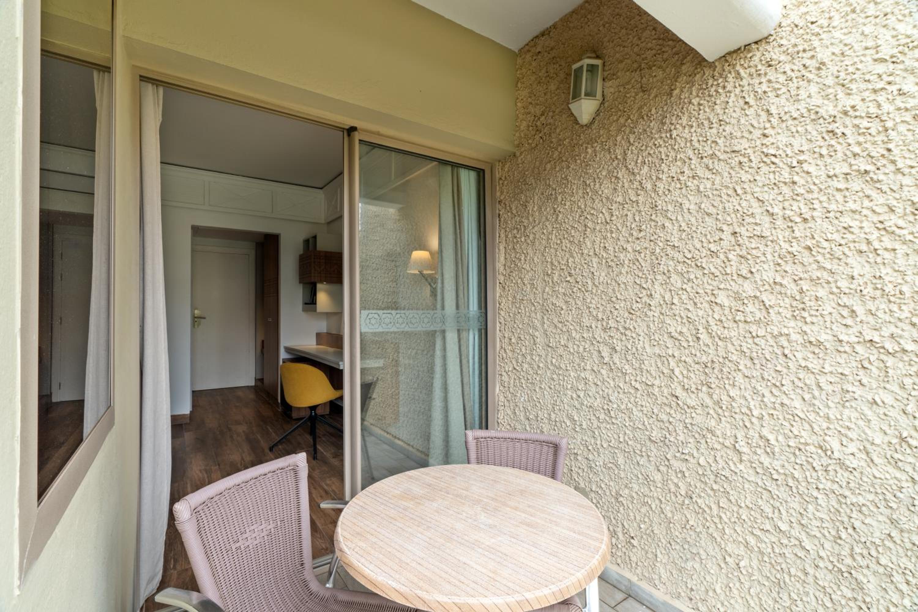 Double Room (2 Adults + 1 Child) Garden View