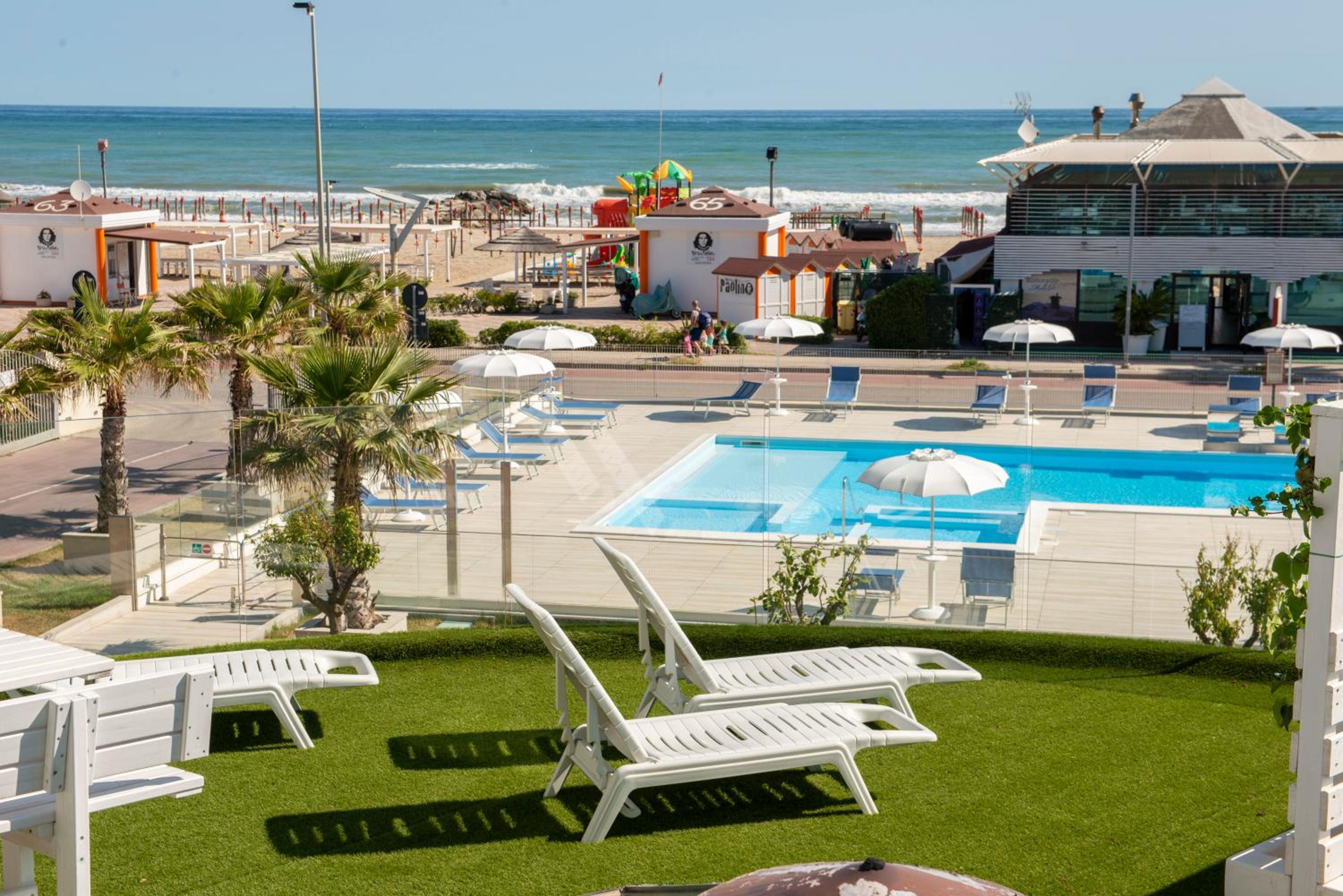 Sea Front Apartment with Grass Terrace