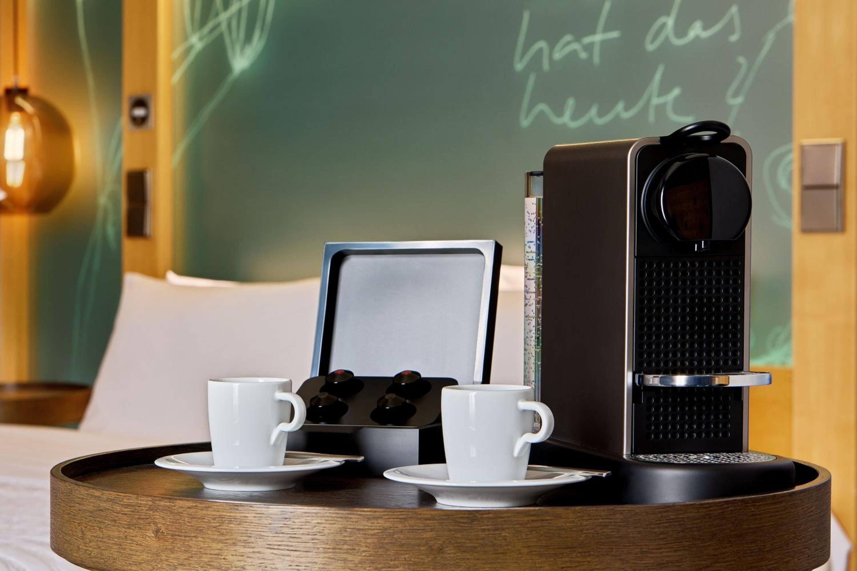 Superior Guest Room with Sofa Bed and Courtyard View