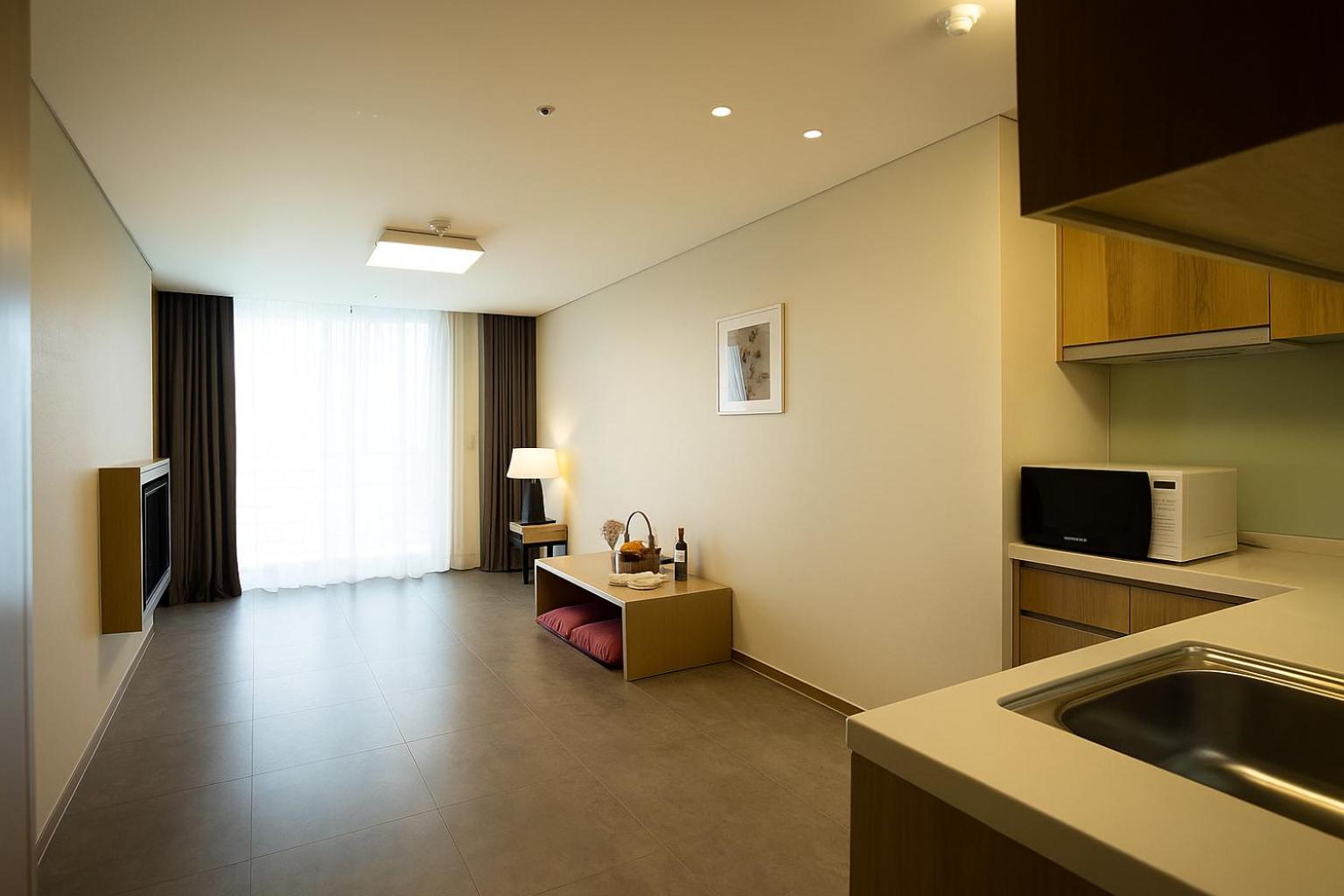 Residence Suite Ondol (partial beach view) with 2 double mattress topper