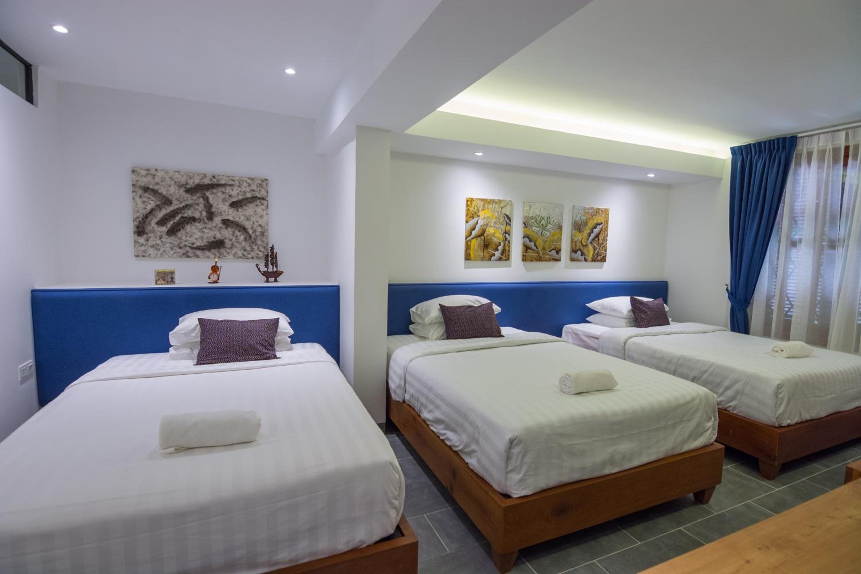 Deluxe Triple Room