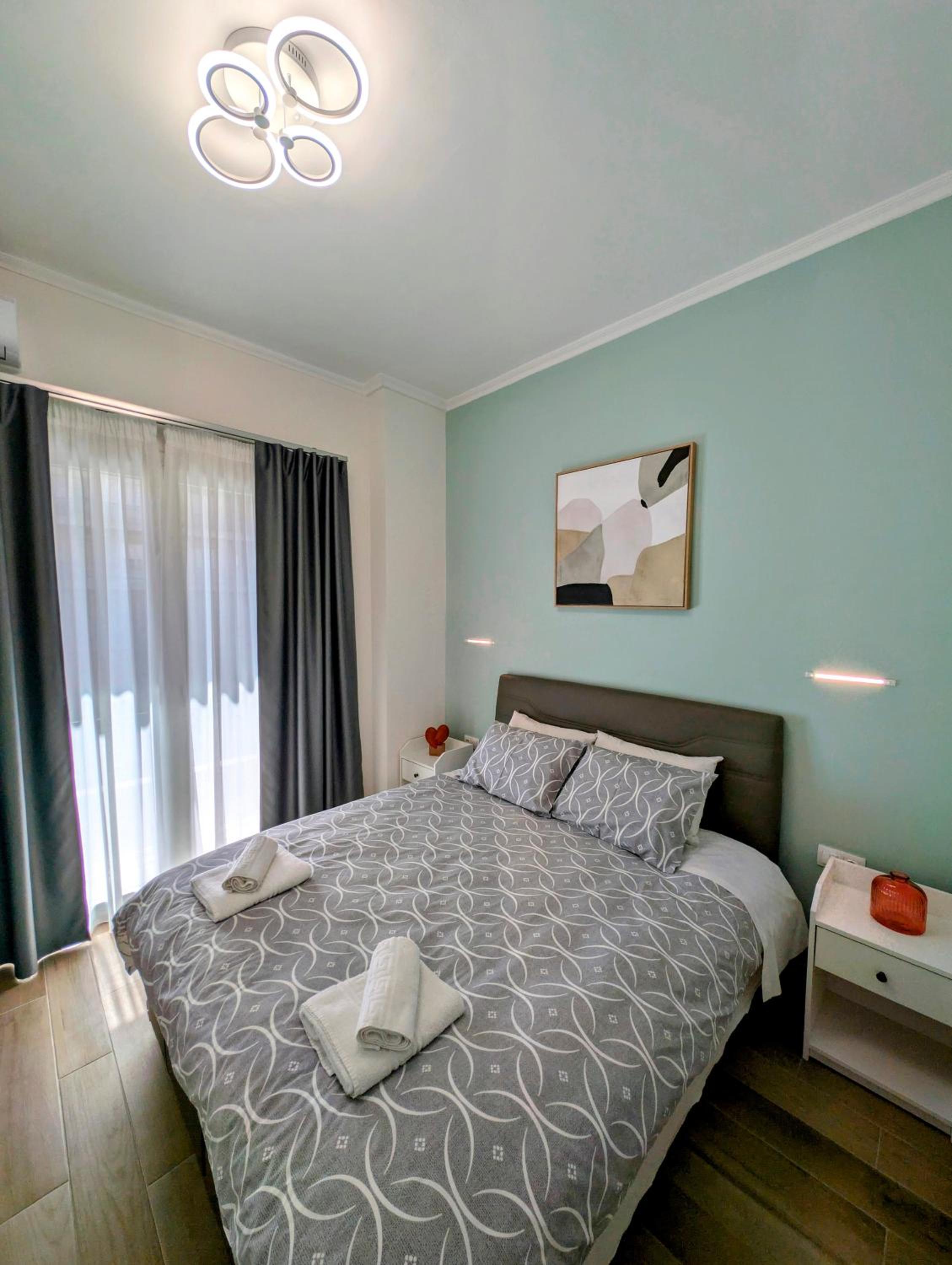 One-Bedroom Apartment with Balcony and City View