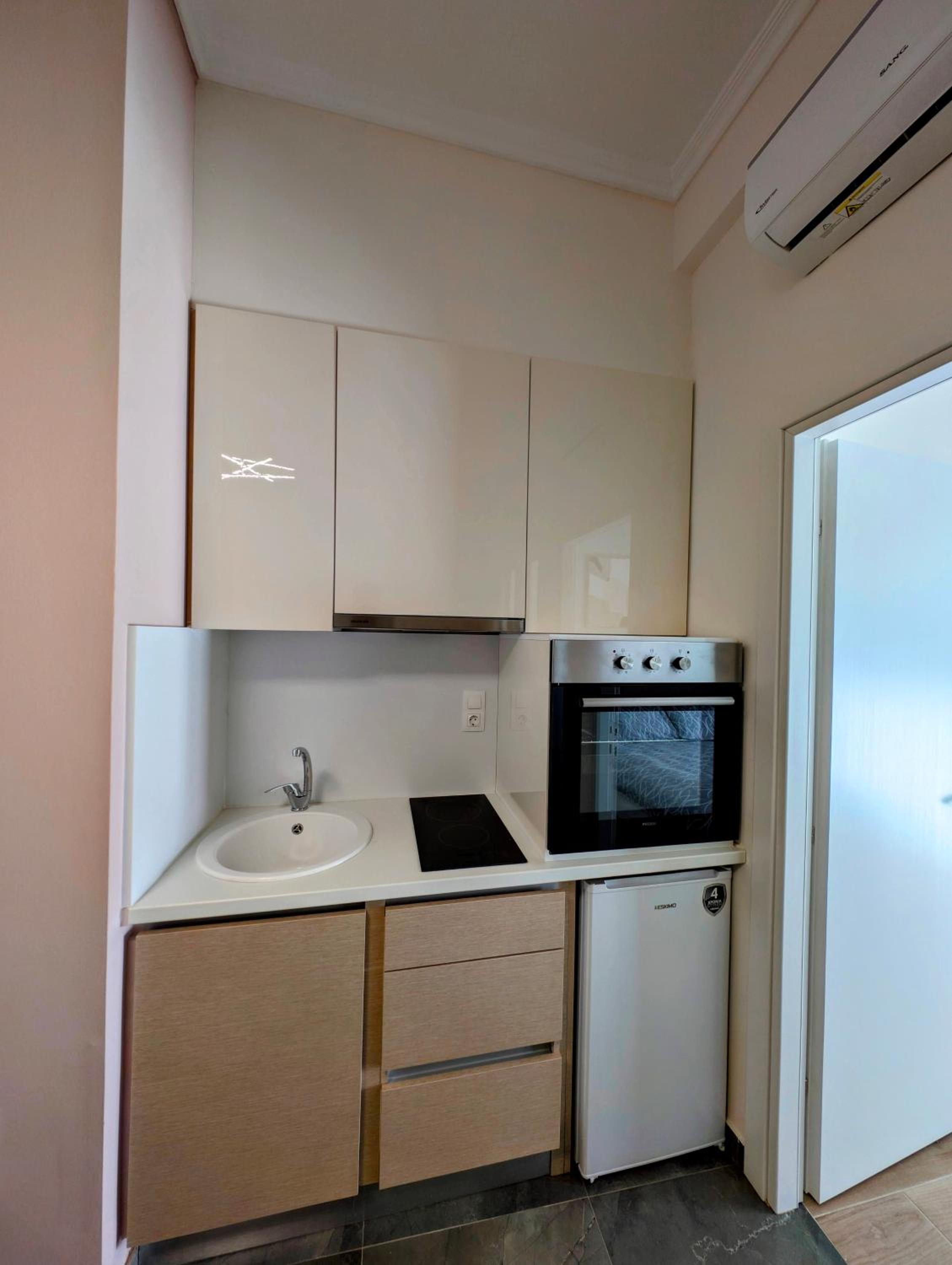 One-Bedroom Apartment with Balcony and City View