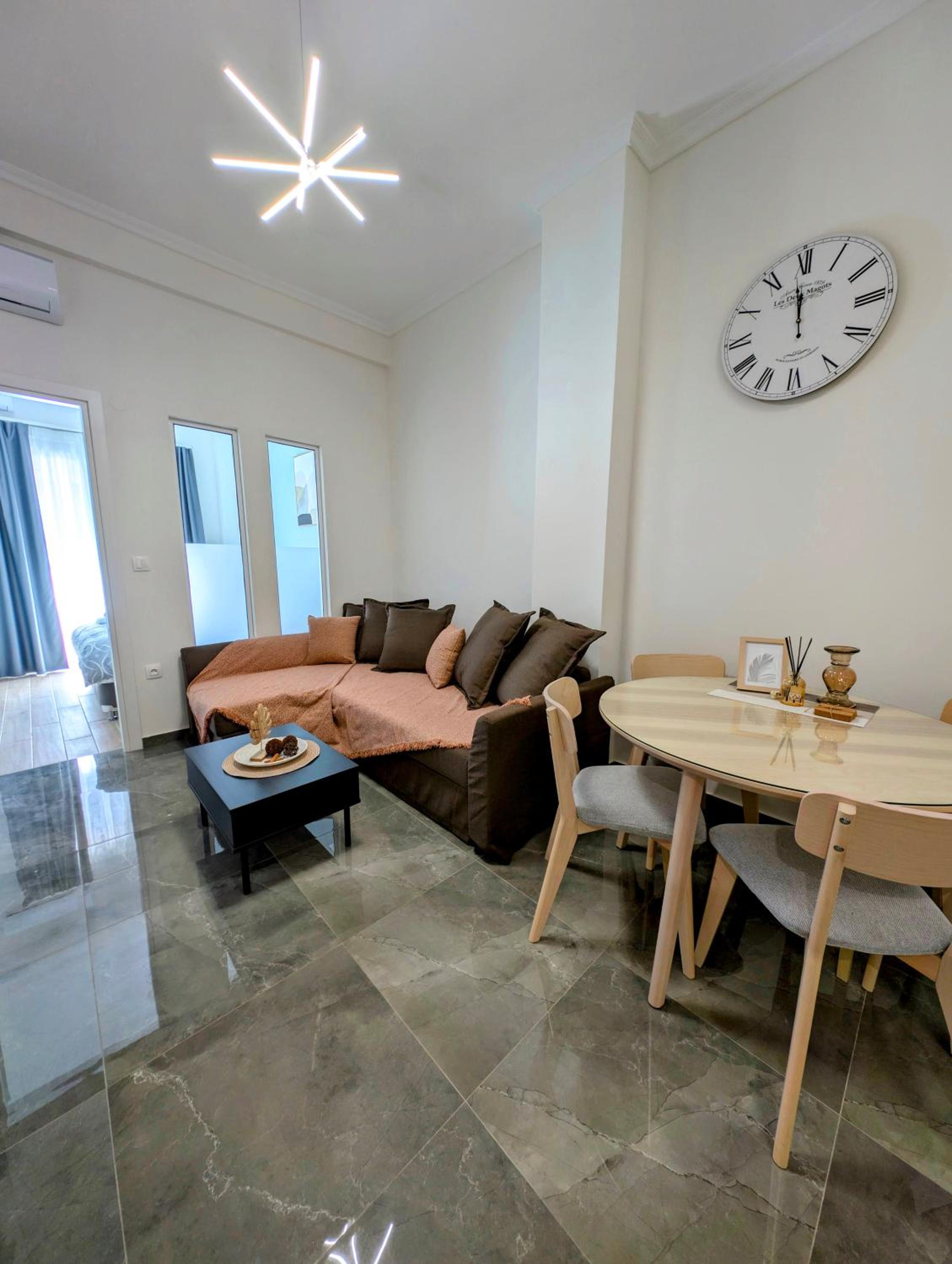 One-Bedroom Apartment with Balcony and City View