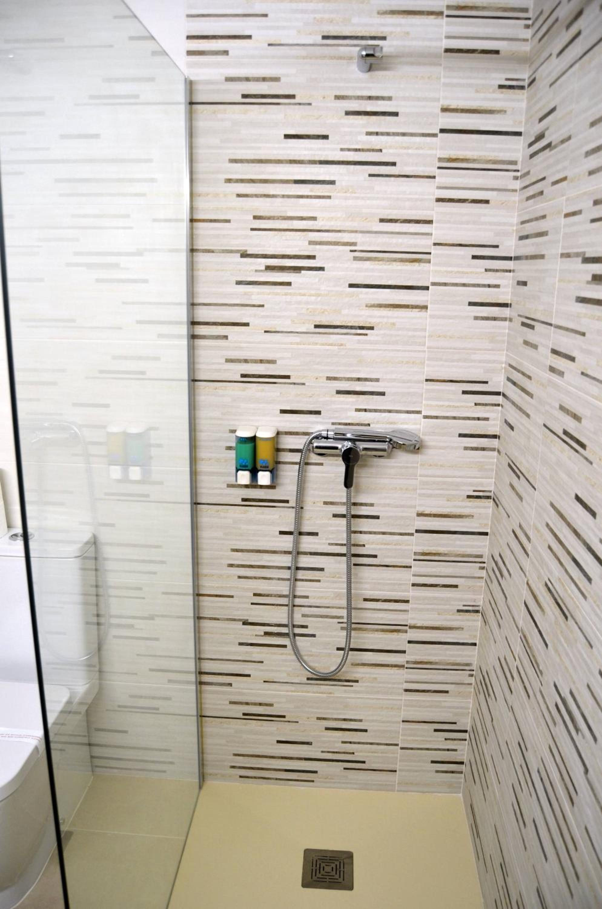 Quadruple Room (3 Adults + 1 Child)