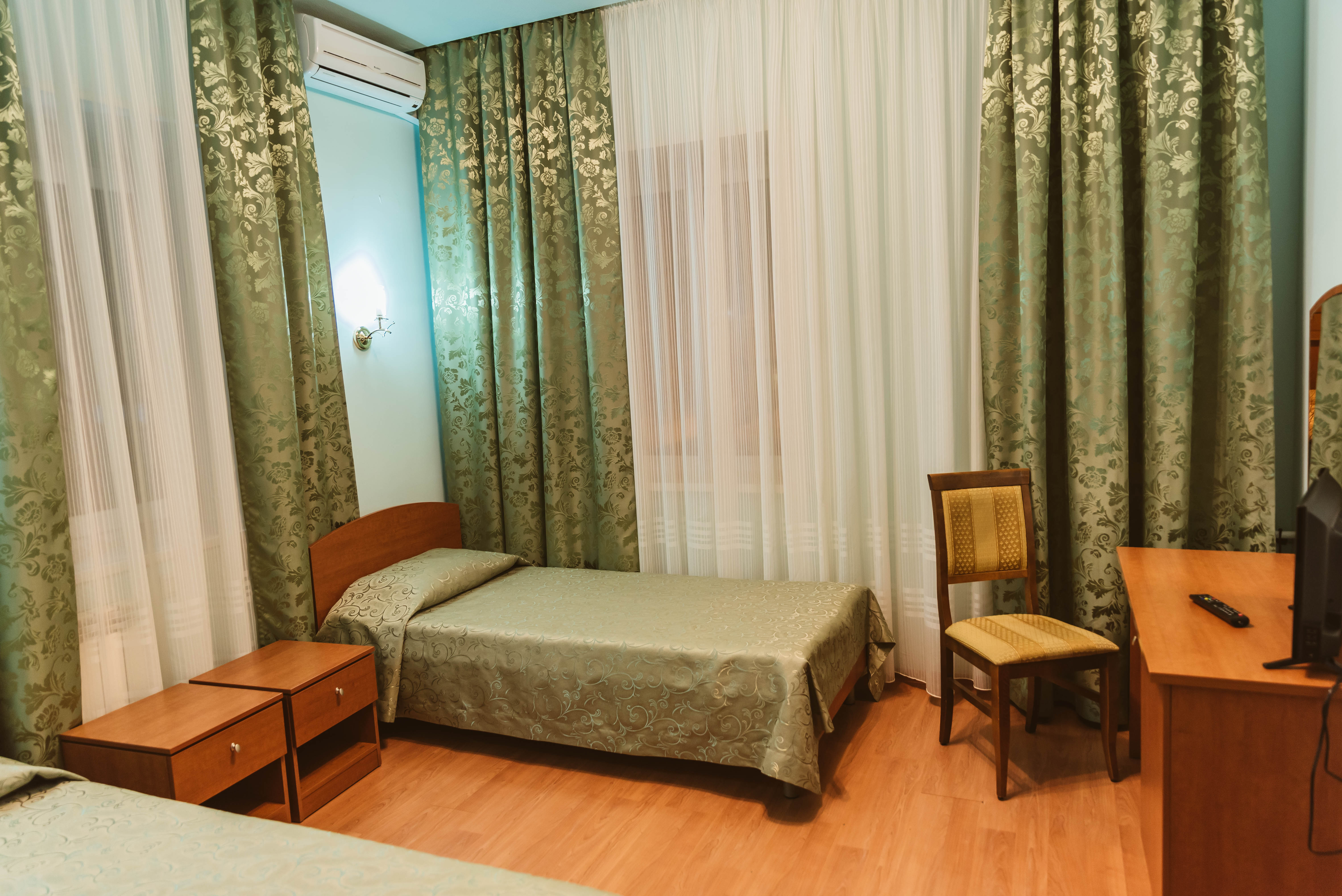 Улучшенный двухместный номер с 2 отдельными кроватями