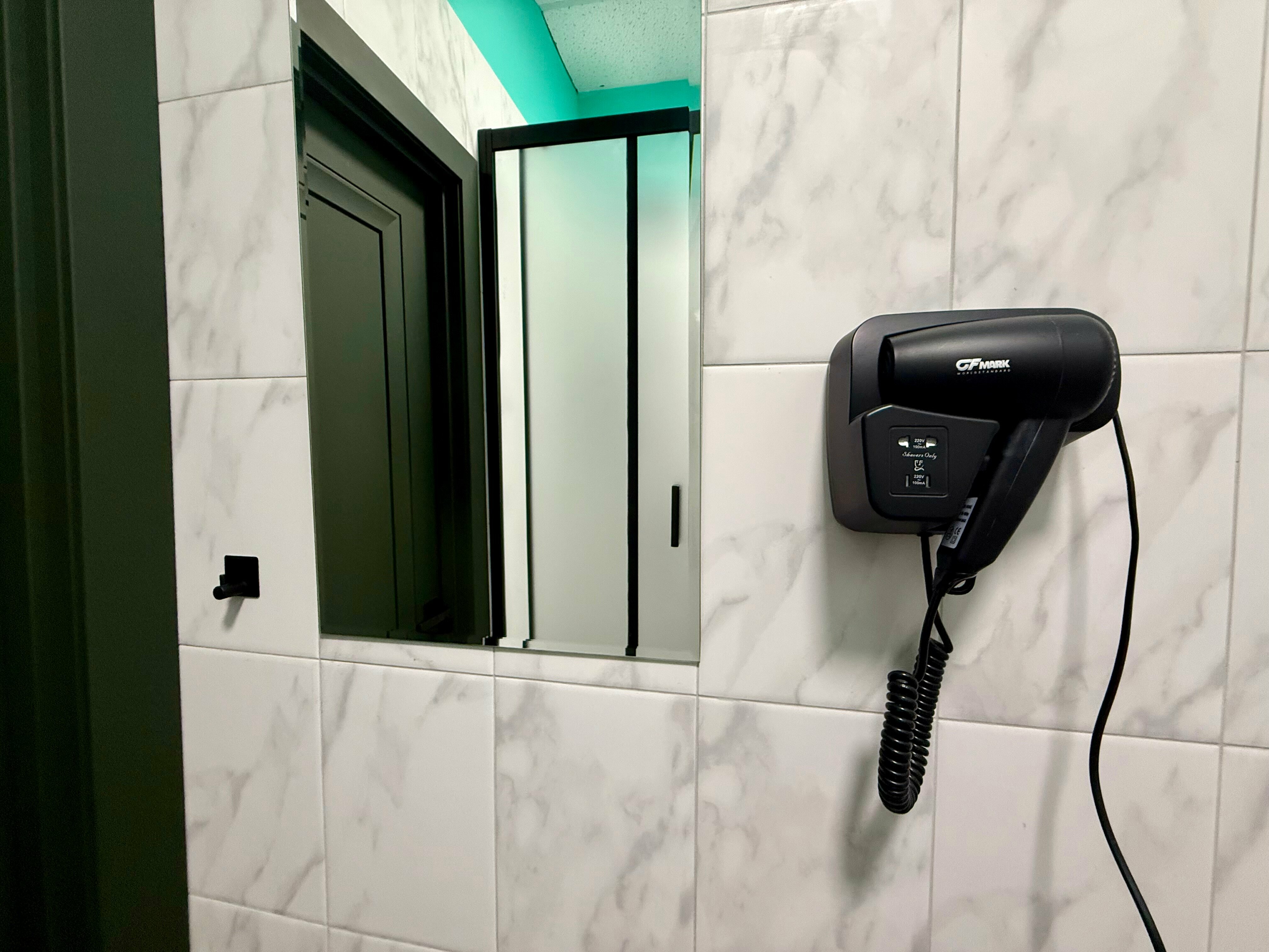 Двухместный номер с 2 отдельными кроватями и душем