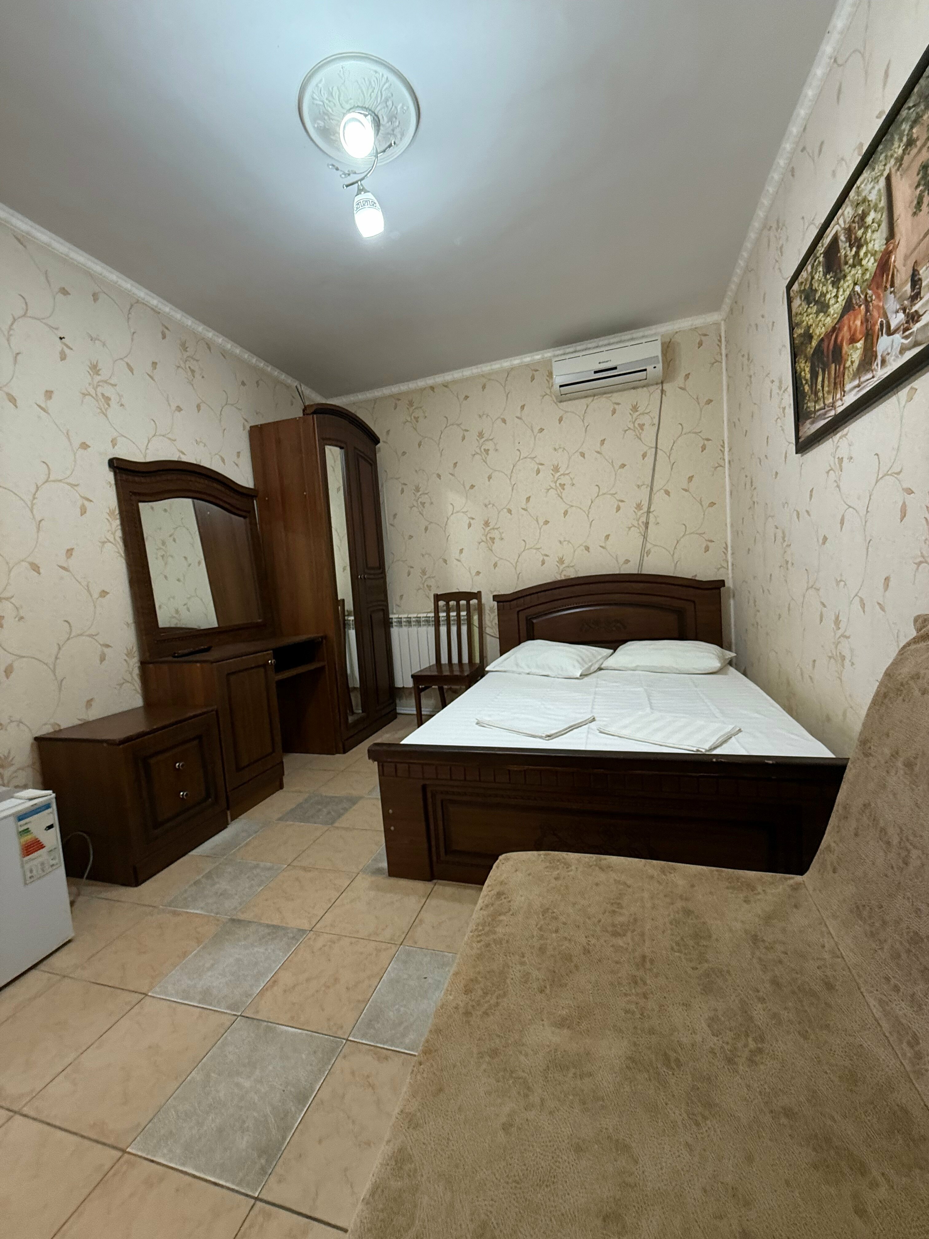 Улучшенный четырехместный номер