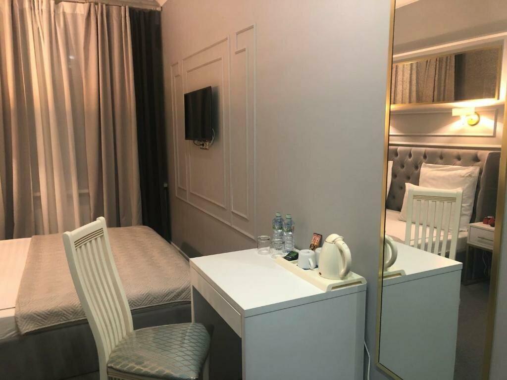 Улучшенный двухместный номер с 2 отдельными кроватями