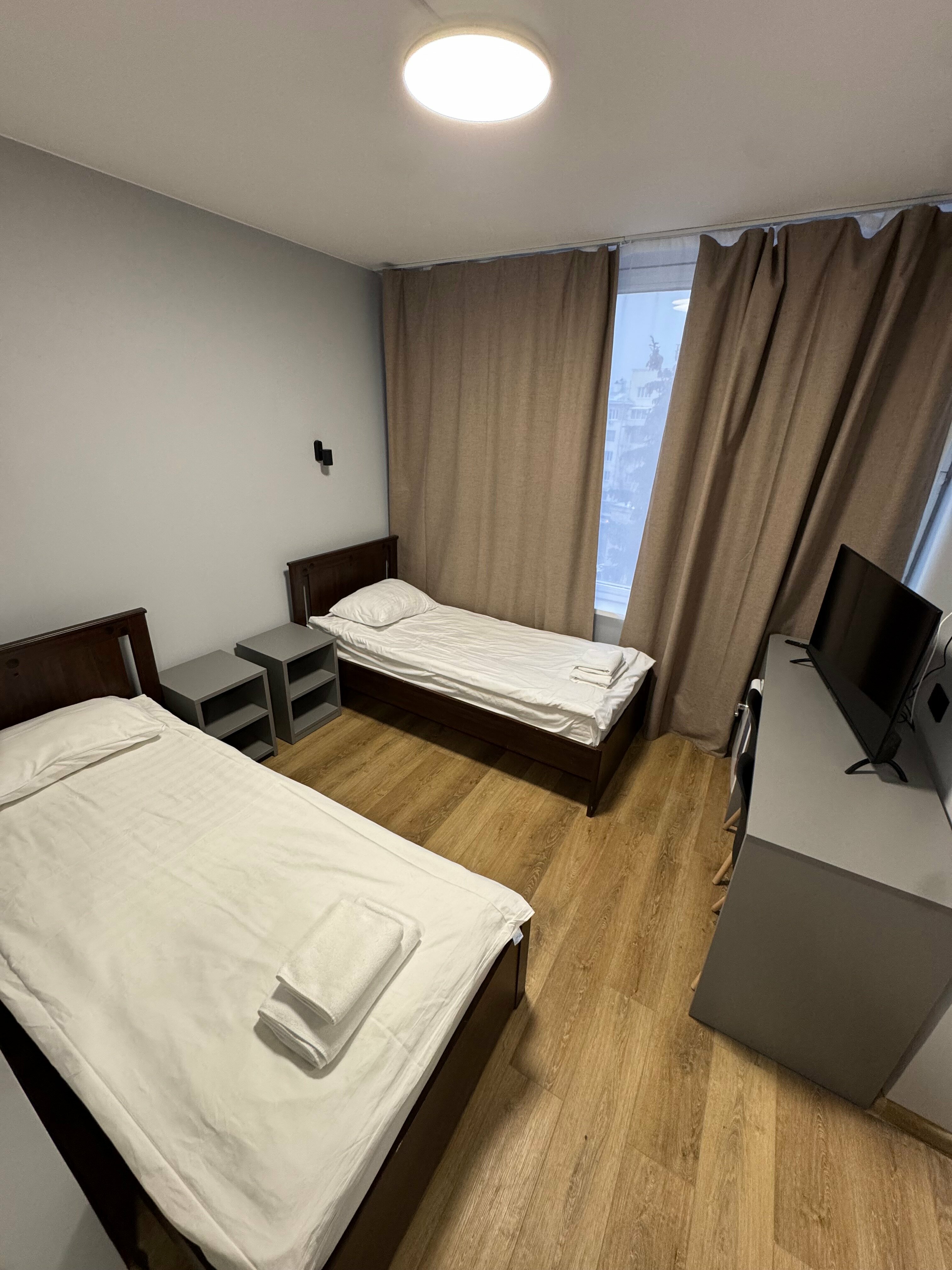 Улучшенный двухместный номер с 2 отдельными кроватями