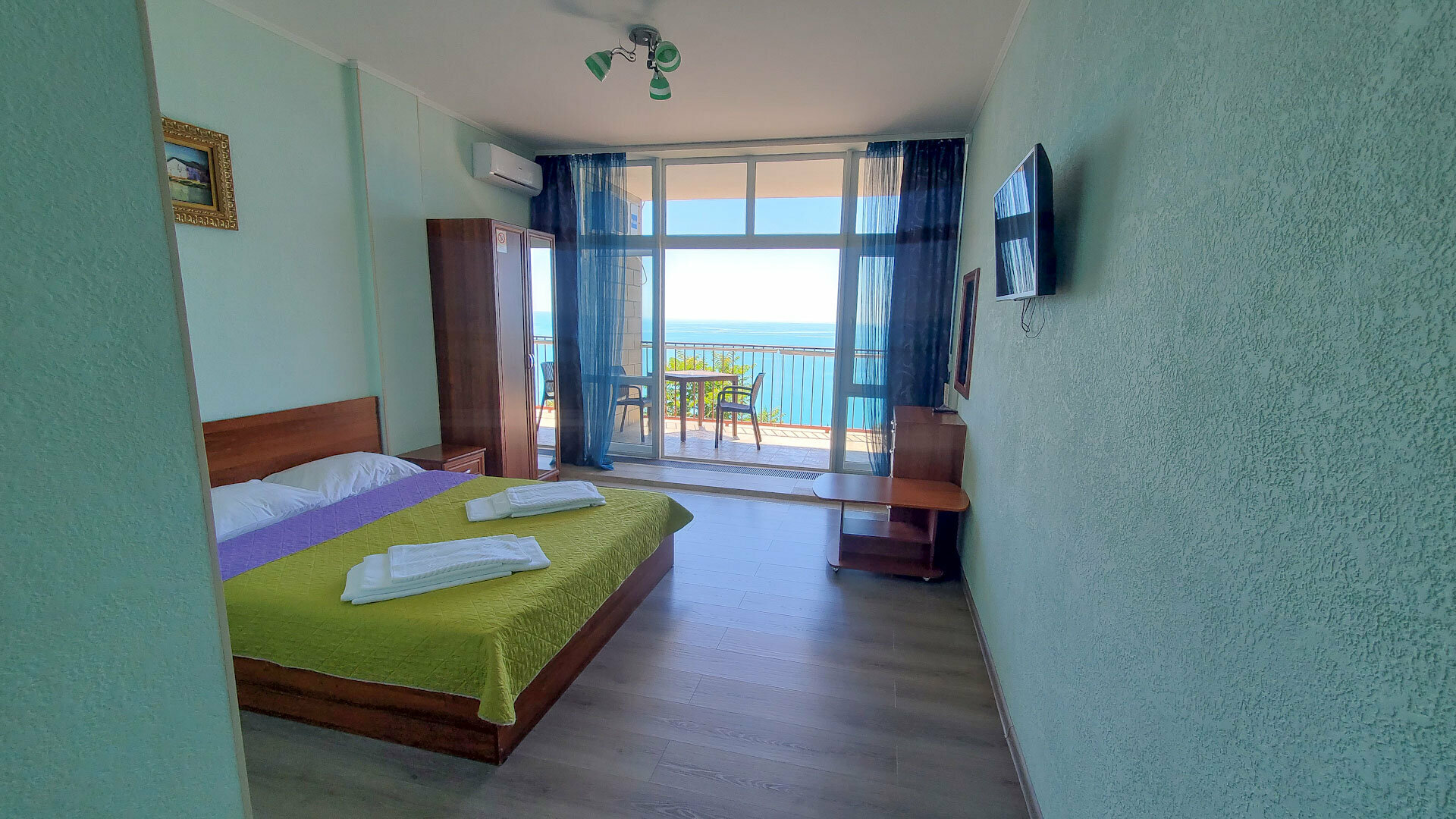 Двухместный однокомнатный люкс с кухней и видом на море